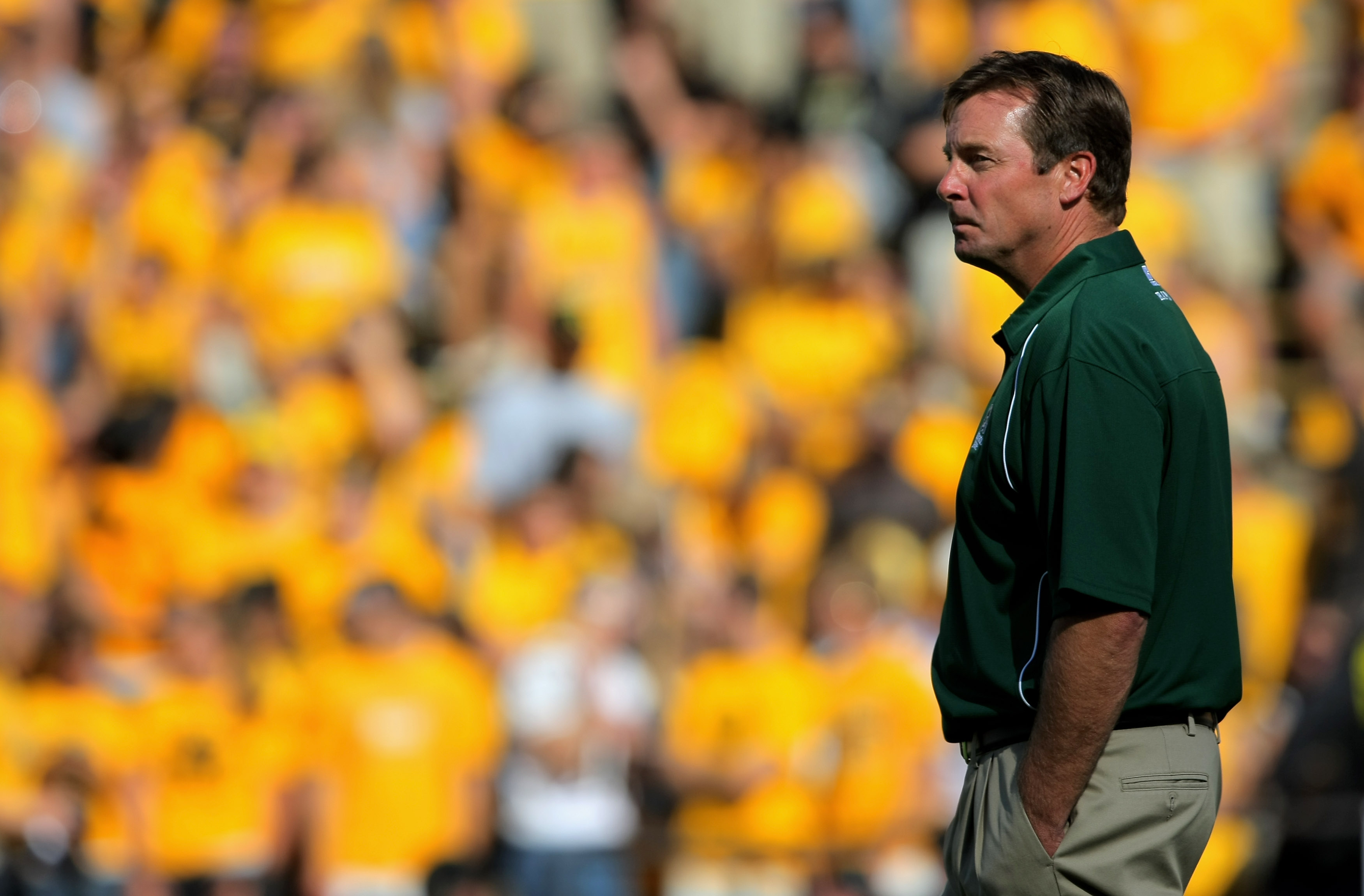 BOULDER, CO - SEPTEMBER 06:  Head coach Steve Fairchild of the Colorado State Rams walks the field during warm ups prior to facing the Colorado Buffaloes at Folsom Field on September 6, 2009 in Boulder, Colorado.  (Photo by Doug Pensinger/Getty Images)