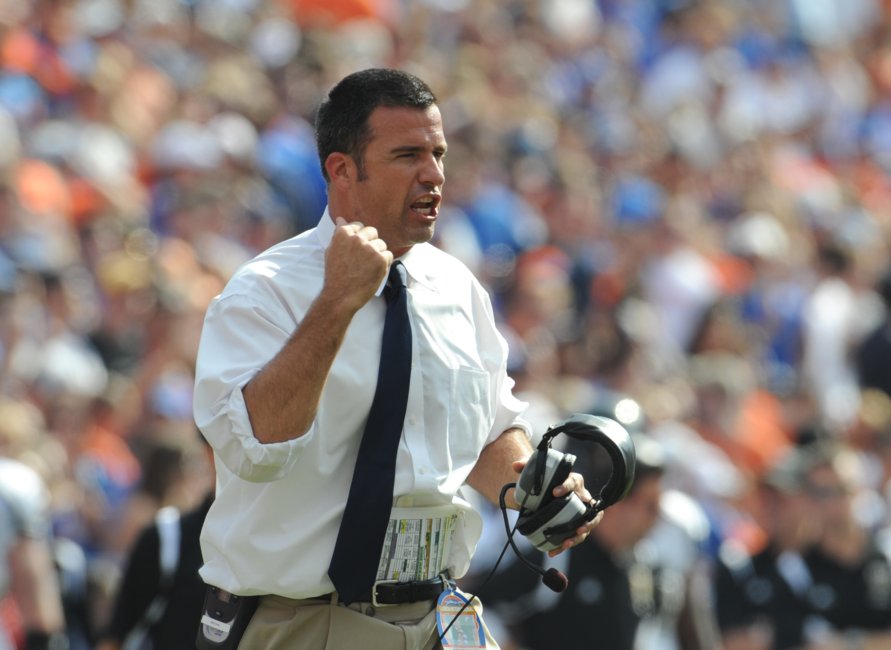 GAINESVILLE, FL - NOVEMBER 21: Coacg Mario Cristobal of the Florida International University Golden Panthers directs play against the Florida Gators, November 21, 2009 at Ben Hill Griffin Stadium in Gainesville, Florida.  (Photo by Al Messerschmidt/Getty