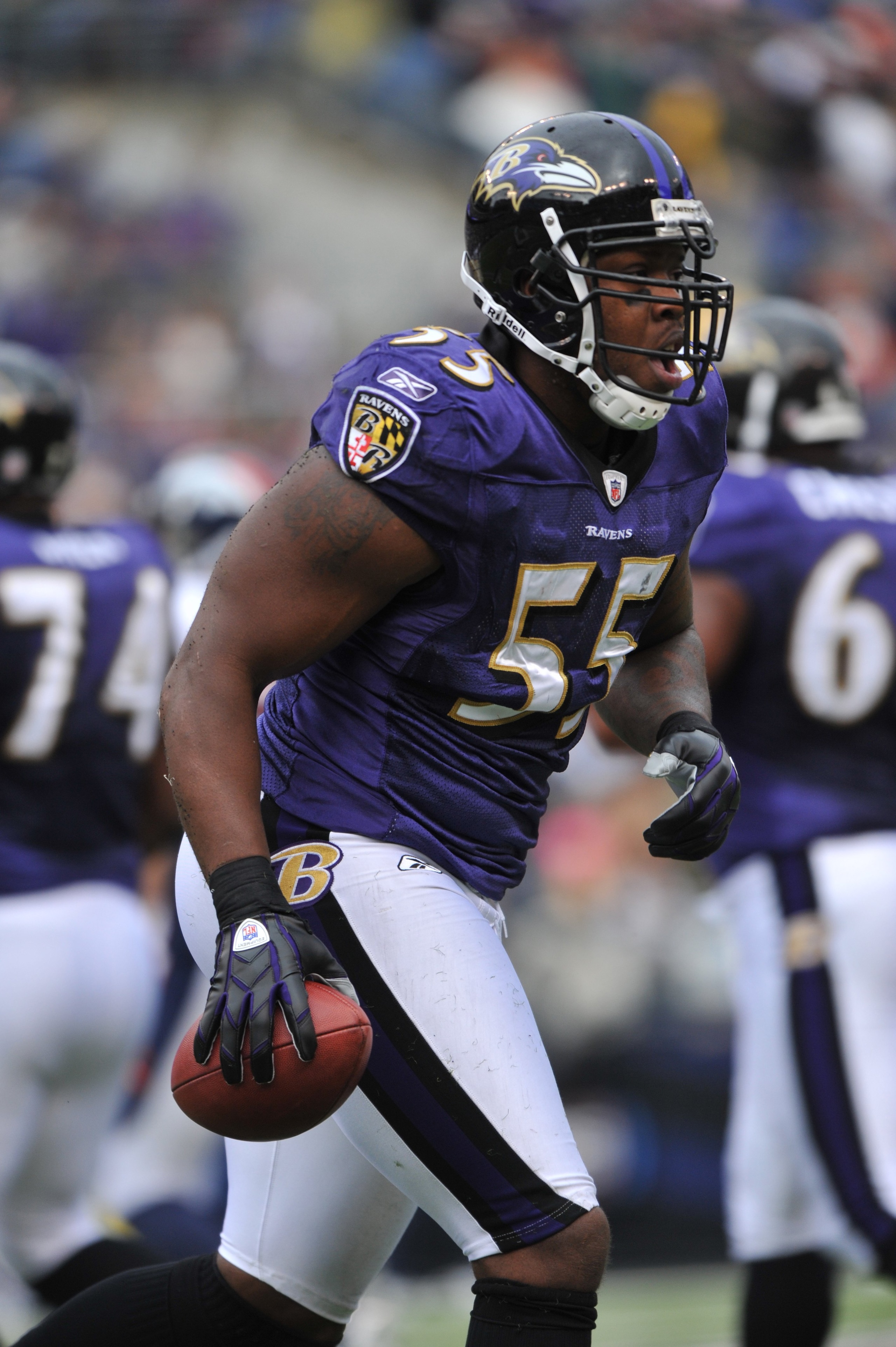BALTIMORE - NOVEMBER 1: Terrell Suggs #55 of the Baltimore Ravens comes up with the ball during the game against the Denver Broncos at M&T Bank Stadium on November 1, 2009 in Baltimore, Maryland. The Ravens defeated the Broncos 30-7. (Photo by Larry Fren BALTIMORE - NOVEMBER 1: Terrell Suggs #55 of the Baltimore Ravens comes up with the ball during the game against the Denver Broncos at M&T Bank Stadium on November 1, 2009 in Baltimore, Maryland. The Ravens defeated the Broncos 30-7. (Photo by Larry Fren