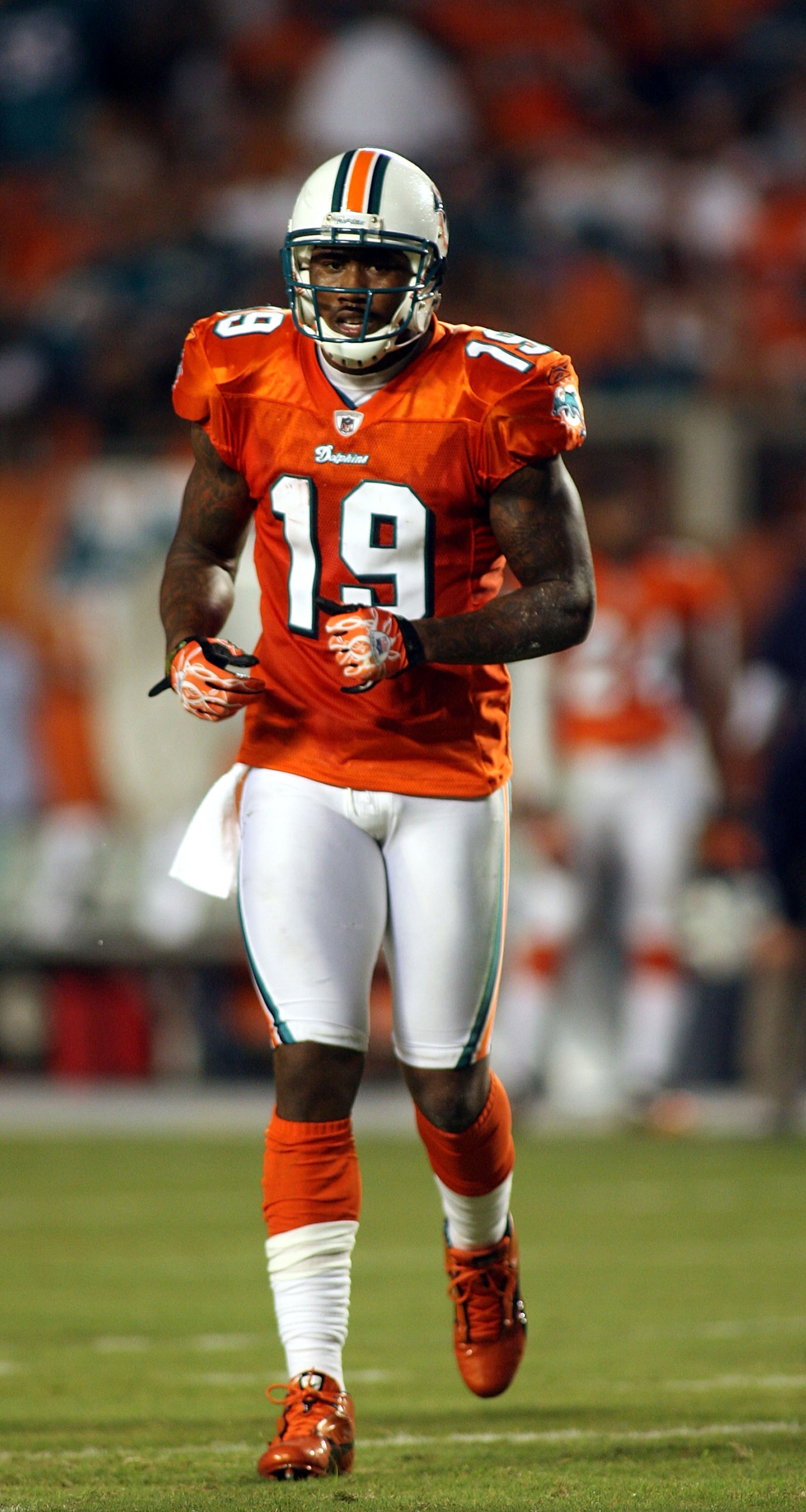 MIAMI - SEPTEMBER 26: Receiver Brandon Marshall #19 of the Miami Dolphins shouts during a game against the New York Jets at Sun Life Stadium on September 26, 2010 in Miami, Florida. (Photo by Marc Serota/Getty Images) MIAMI - SEPTEMBER 26: Receiver Brandon Marshall #19 of the Miami Dolphins shouts during a game against the New York Jets at Sun Life Stadium on September 26, 2010 in Miami, Florida. (Photo by Marc Serota/Getty Images)