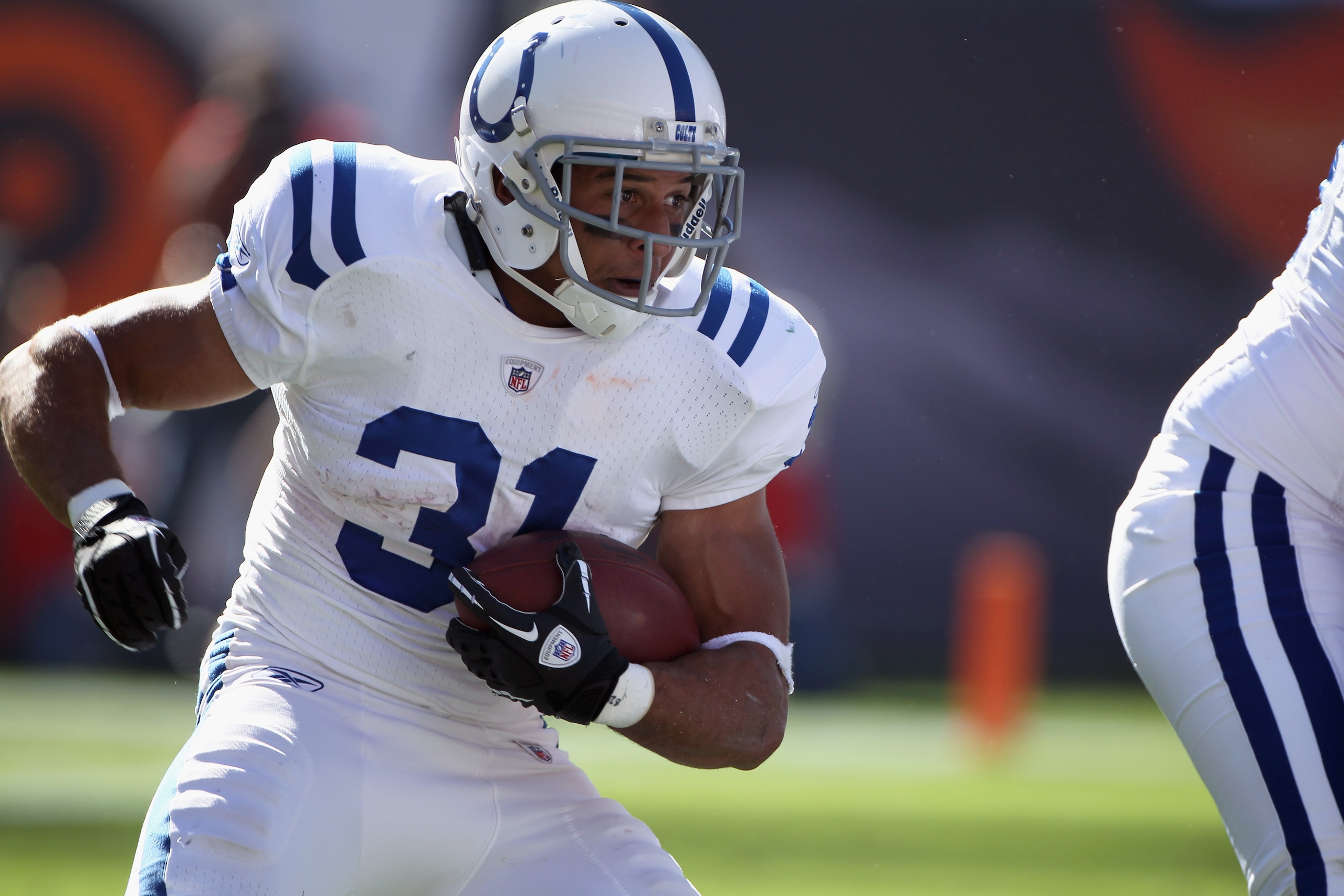 DENVER - SEPTEMBER 26: Running back Donald Brown #31 of the Indianapolis Colts carries the ball against the Denver Broncos at INVESCO Field at Mile High on September 26, 2010 in Denver, Colorado. The Colts defeated the Broncos 27-13. (Photo by Doug Pens DENVER - SEPTEMBER 26: Running back Donald Brown #31 of the Indianapolis Colts carries the ball against the Denver Broncos at INVESCO Field at Mile High on September 26, 2010 in Denver, Colorado. The Colts defeated the Broncos 27-13. (Photo by Doug Pens