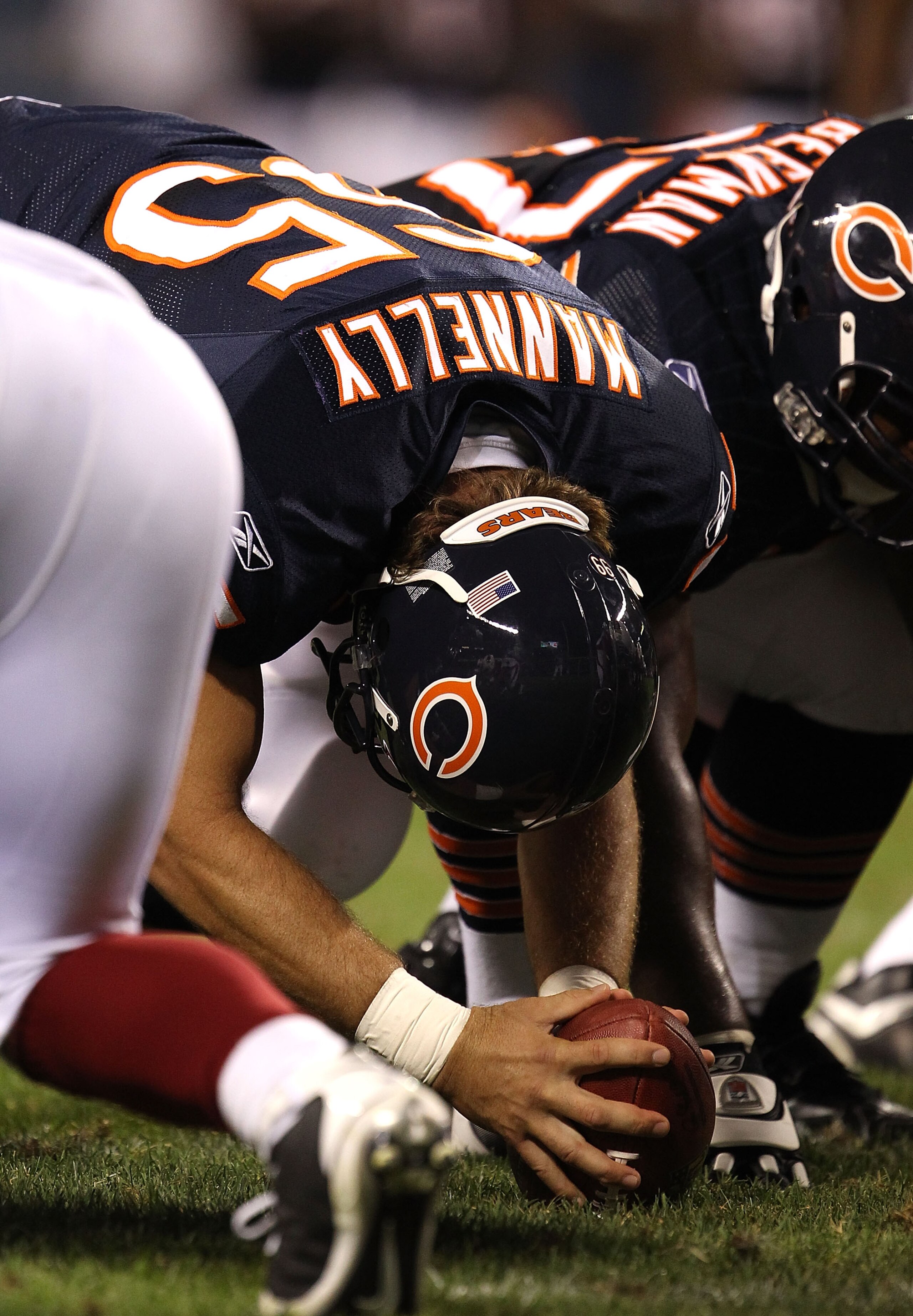 CHICAGO - AUGUST 28: Patrick Mannelly #65 of the Chicago Bears prepares to snap the ball against the Arizona Cardinals during a preseason game at Soldier Field on August 28, 2010 in Chicago, Illinois. The Cardinals defeated the Bears 14-9. (Photo by Jonat CHICAGO - AUGUST 28: Patrick Mannelly #65 of the Chicago Bears prepares to snap the ball against the Arizona Cardinals during a preseason game at Soldier Field on August 28, 2010 in Chicago, Illinois. The Cardinals defeated the Bears 14-9. (Photo by Jonat