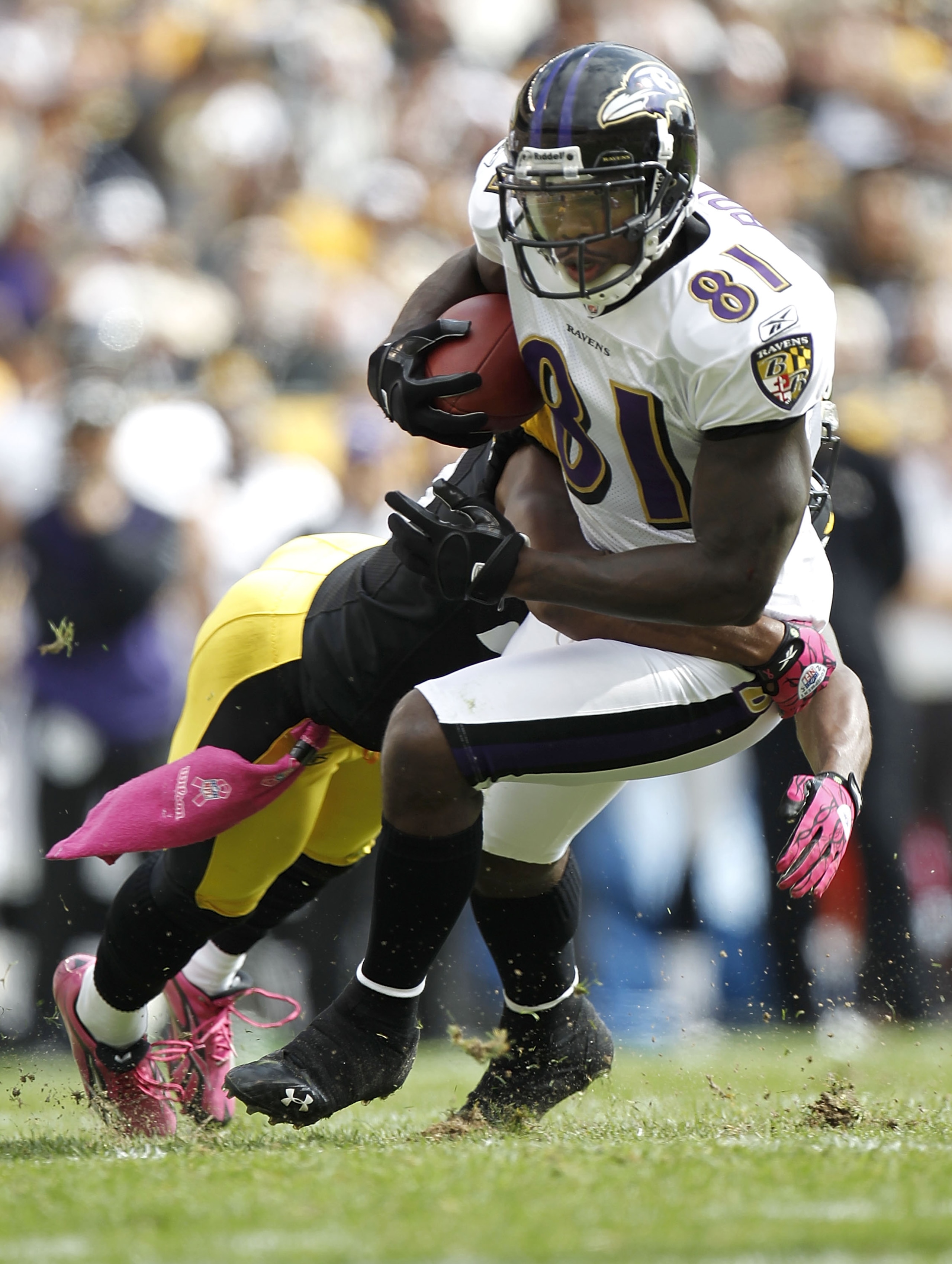 PITTSBURGH - OCTOBER 03: Anquan Boldin #81 of the Baltimore Ravens looks for yards after the catch next to Ryan Clark #25 of the Pittsburgh Steelers on October 3, 2010 at Heinz Field in Pittsburgh, Pennsylvania. (Photo by Gregory Shamus/Getty Images) PITTSBURGH - OCTOBER 03: Anquan Boldin #81 of the Baltimore Ravens looks for yards after the catch next to Ryan Clark #25 of the Pittsburgh Steelers on October 3, 2010 at Heinz Field in Pittsburgh, Pennsylvania. (Photo by Gregory Shamus/Getty Images)