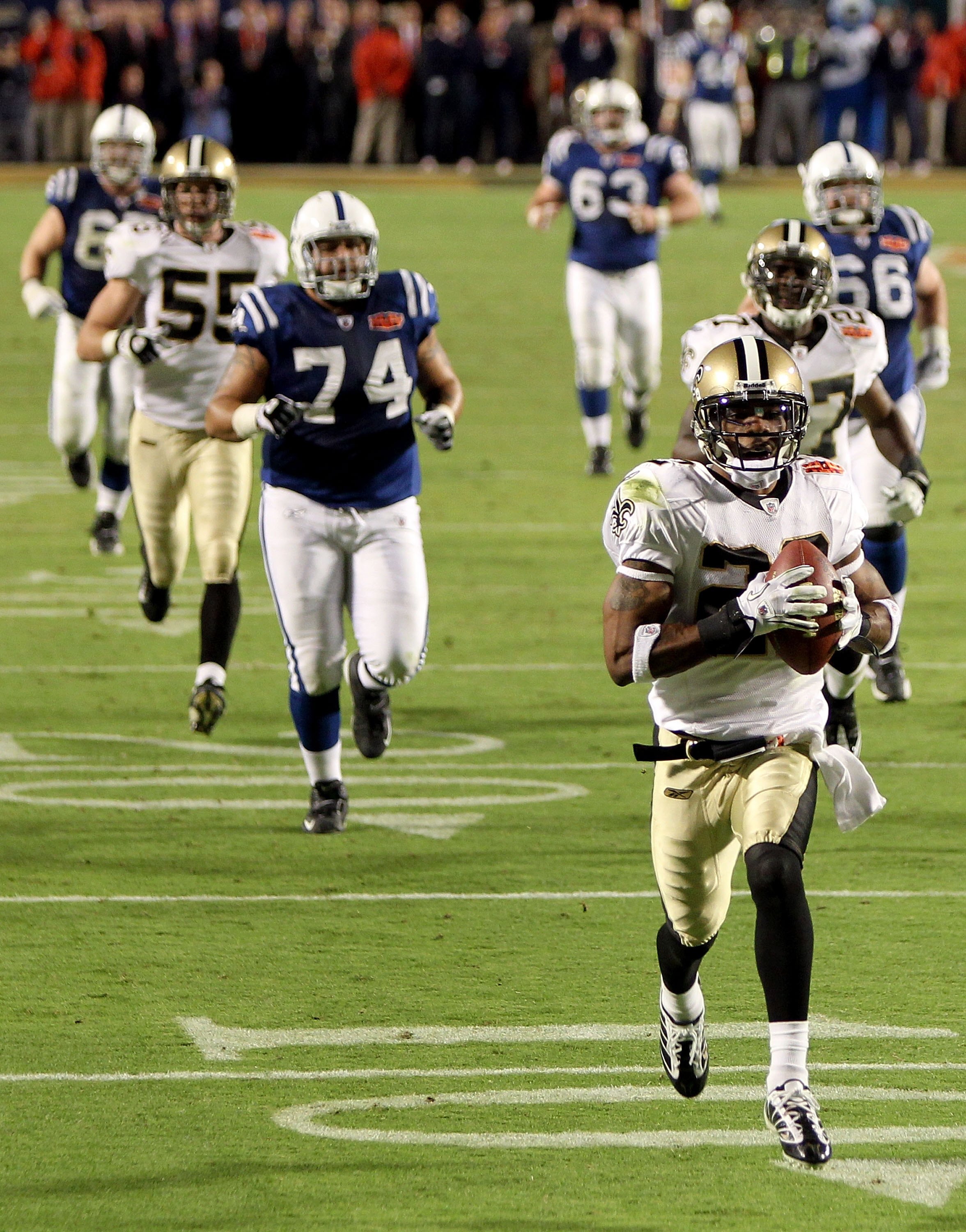 MIAMI GARDENS, FL - FEBRUARY 07:  Tracy Porter #22 of the New Orleans Saints returns a interception for a touchdown against of the Indianapolis Colts during Super Bowl XLIV on February 7, 2010 at Sun Life Stadium in Miami Gardens, Florida.  (Photo by Ezra