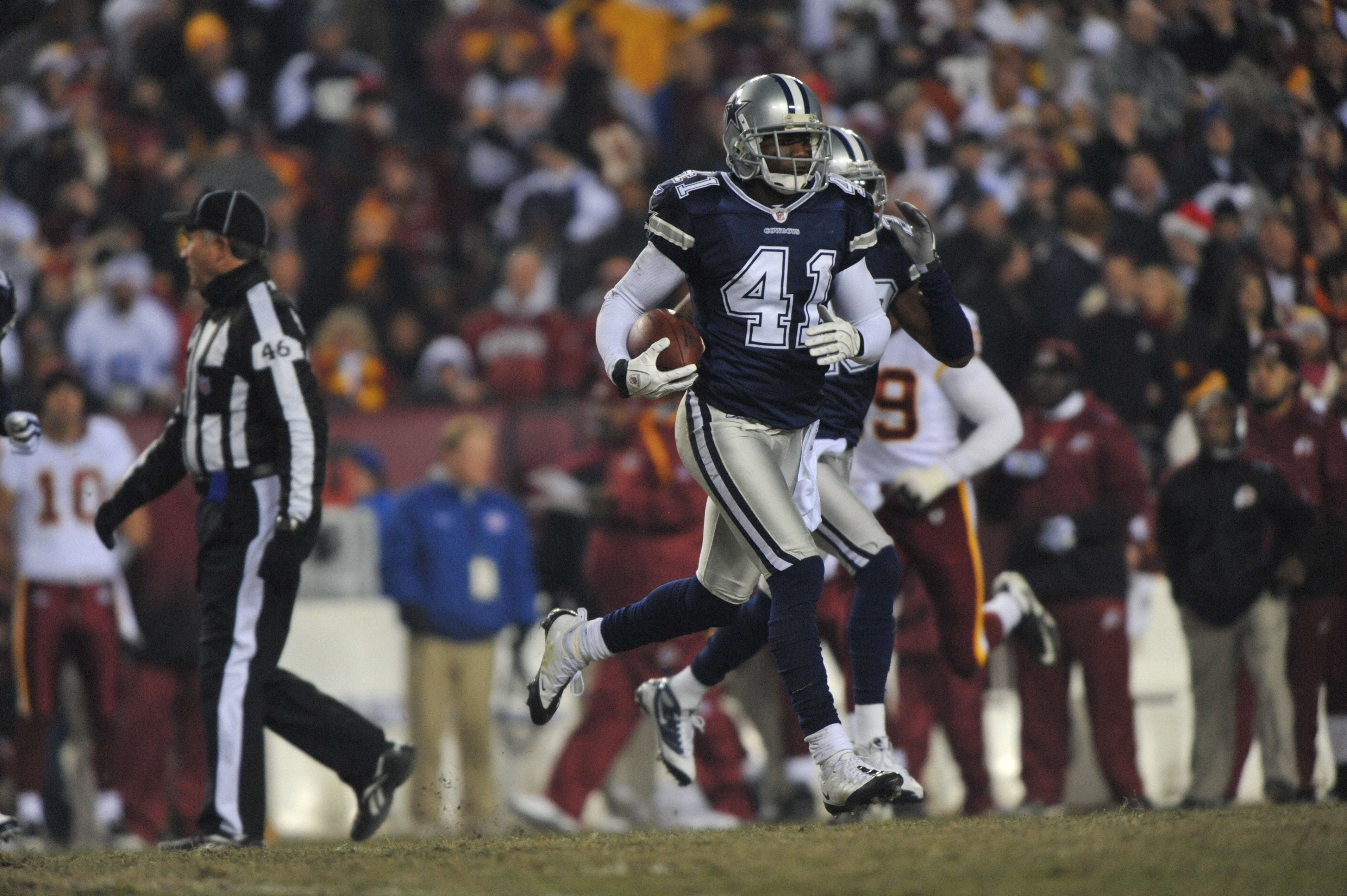 LANDOVER, MD - DECEMBER 27:  Terrence Newman #41 of the Dallas Cowboys runs the ball against the Washington Redskins at FedExField on December 27, 2009 in Landover, Maryland. The Cowboys defeated the Redskins 17-0. (Photo by Larry French/Getty Images)