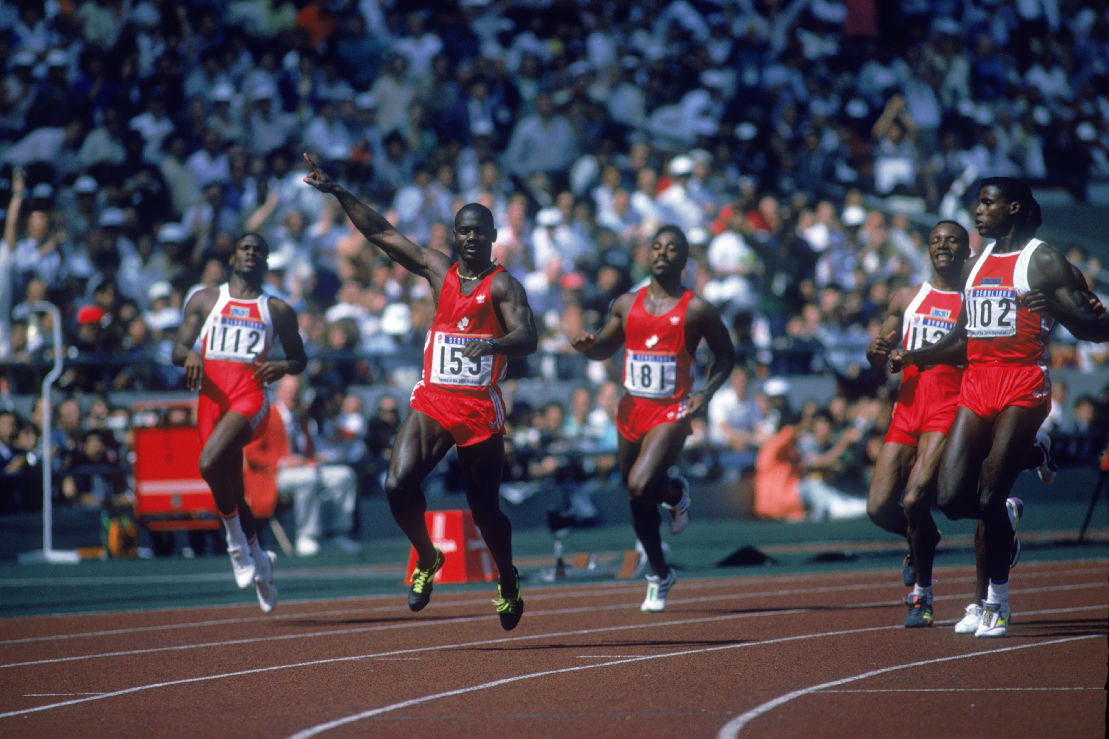 Canadian sprinter Ben Johnson (second from left) wins the final of the 100 Metres event at Seoul Olympic Stadium during the Olympic Games in Seoul, South Korea, 24th September 1988. Johnson won the event in a world record time of 9.79 seconds, but was dis