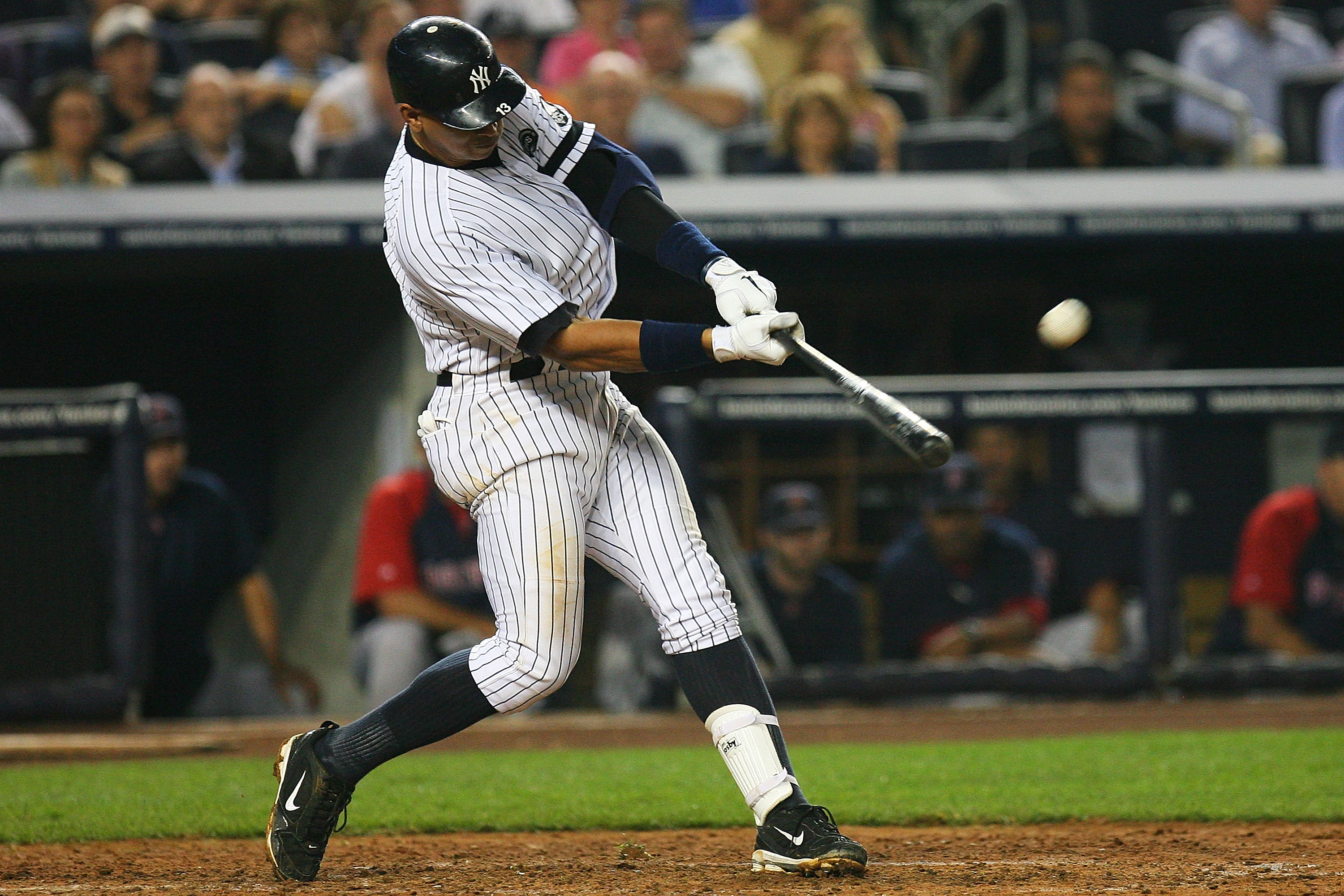 NEW YORK - SEPTEMBER 24:  Alex Rodriguez #13 of the New York Yankees hits a homerun in the sixth inning against the Boston Red Sox on September 24, 2010 at Yankee Stadium in the Bronx borough of New York City.  (Photo by Andrew Burton/Getty Images)