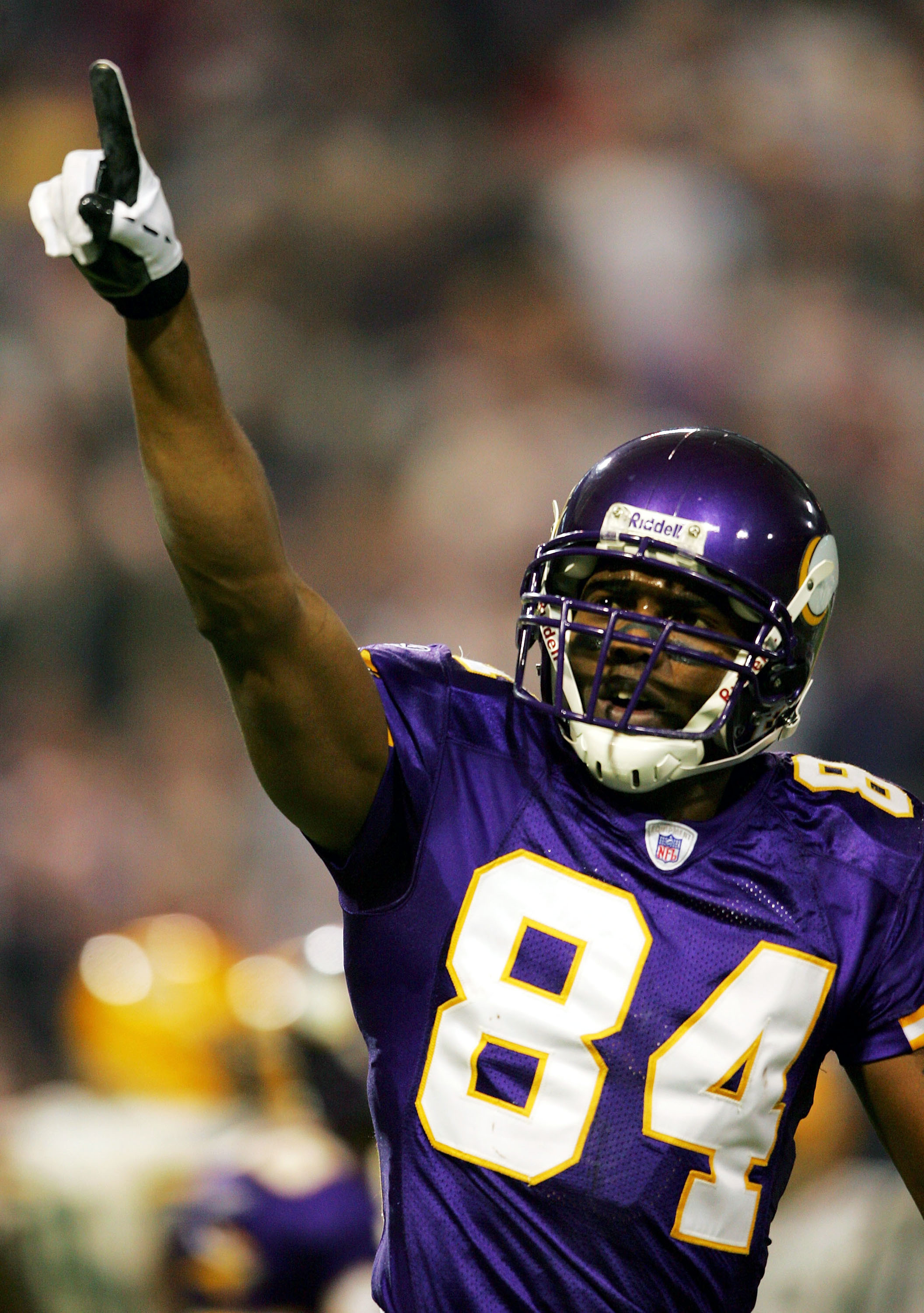 Tennessee Titans wide receiver Randy Moss (84) watches from the