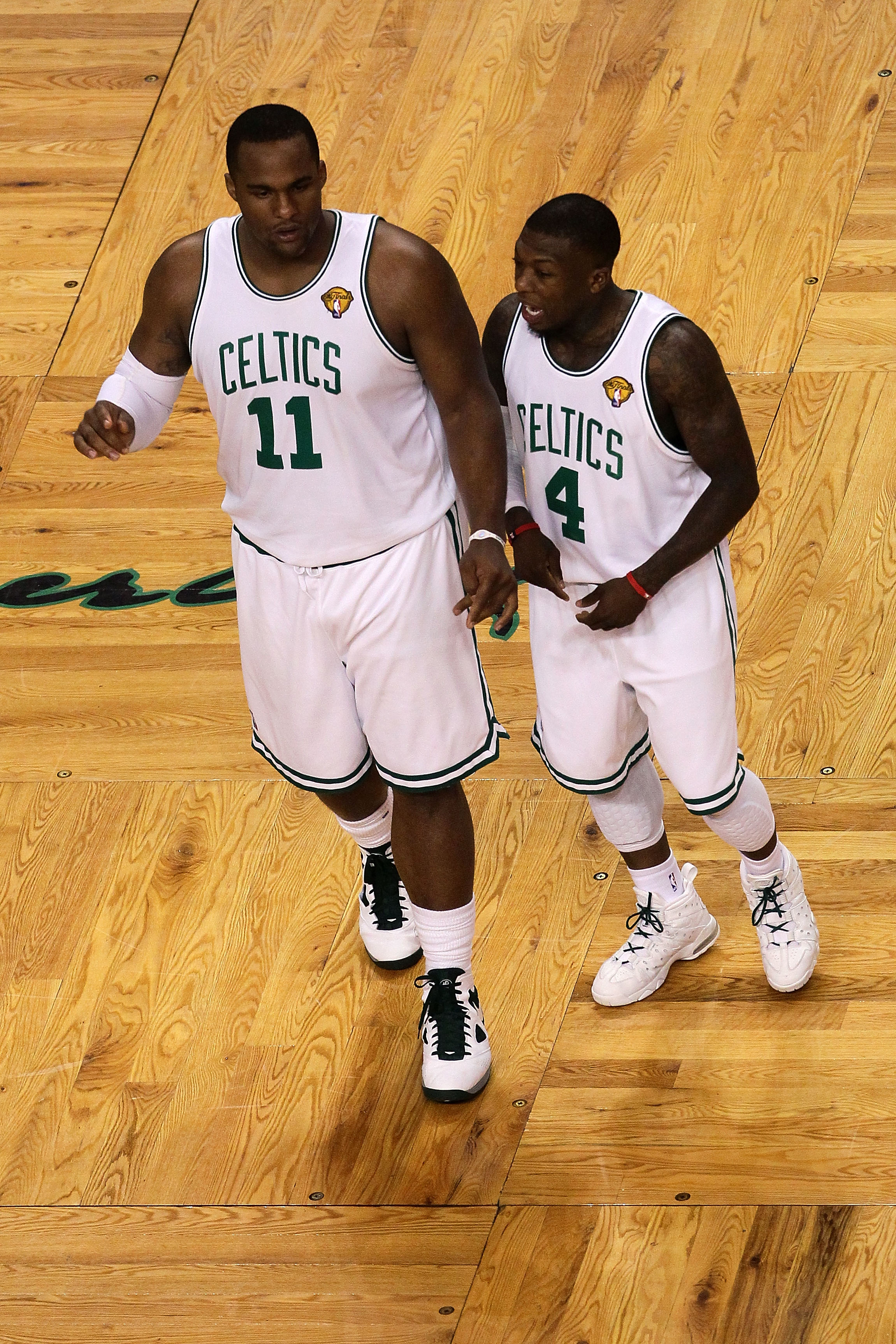 BOSTON - JUNE 10:  (L-R) Glen Davis #11 and Nate Robinson #4 of the Boston Celltics talk on court against the Los Angeles Lakers during Game Four of the 2010 NBA Finals on June 10, 2010 at TD Garden in Boston, Massachusetts. NOTE TO USER: User expressly a