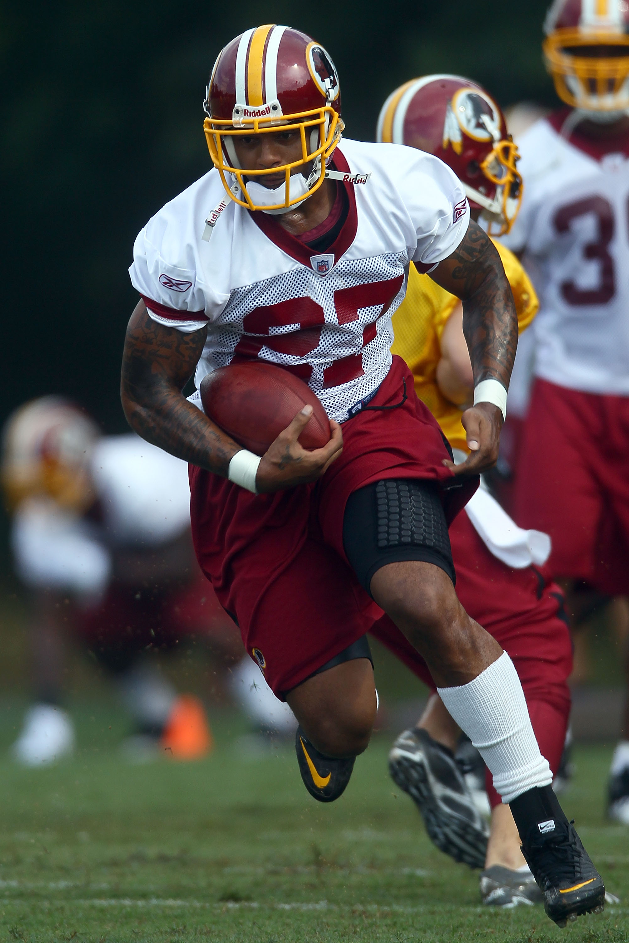 Clinton Portis of the Washington Redskins runs for some of his 90