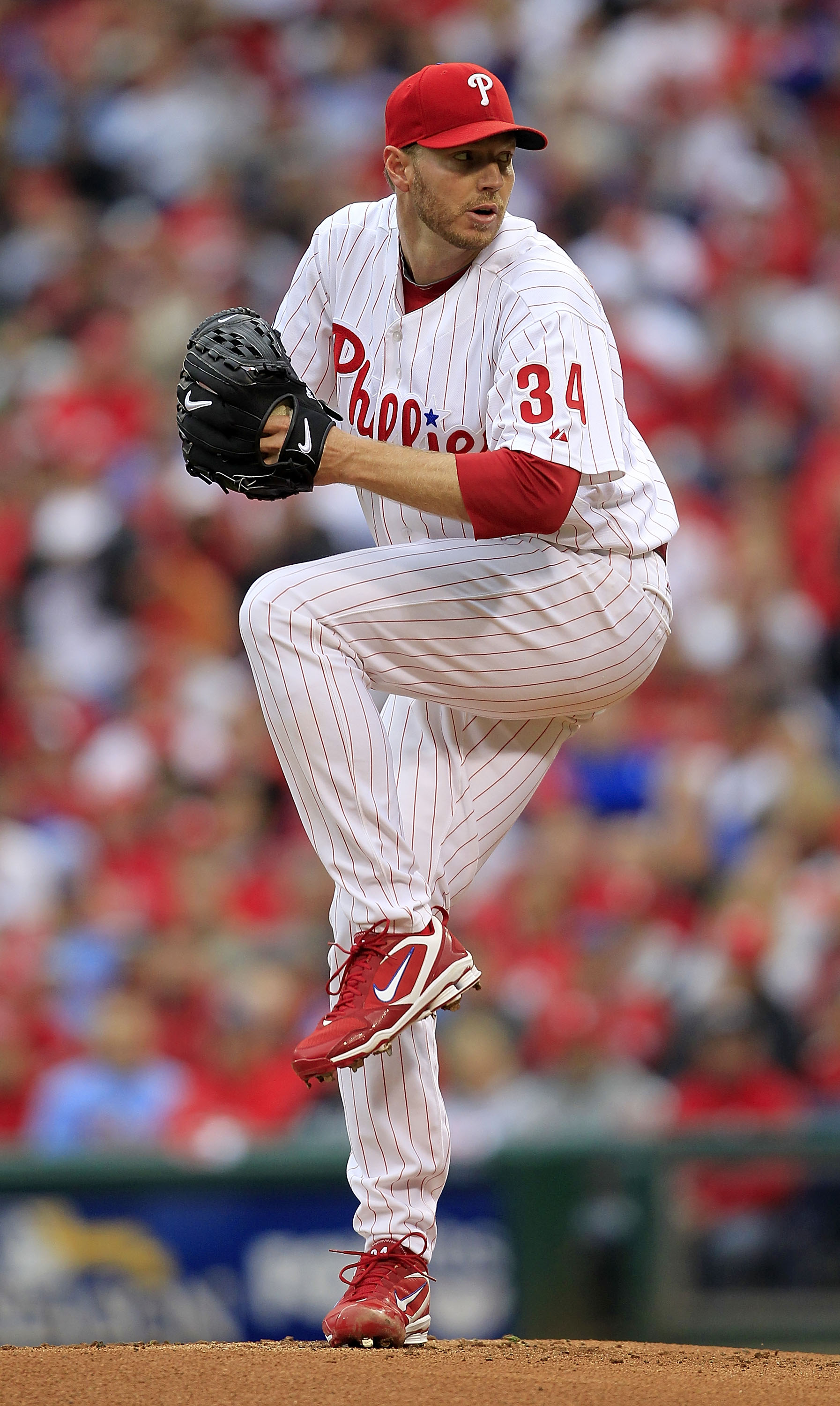 PHILADELPHIA - OCTOBER 06:  Roy Halladay #34 of the Philadelphia Phillies delivers in Game 1 of the NLDS against the Cincinnati Reds at Citizens Bank Park on October 6, 2010 in Philadelphia, Pennsylvania.  (Photo by Chris Trotman/Getty Images)