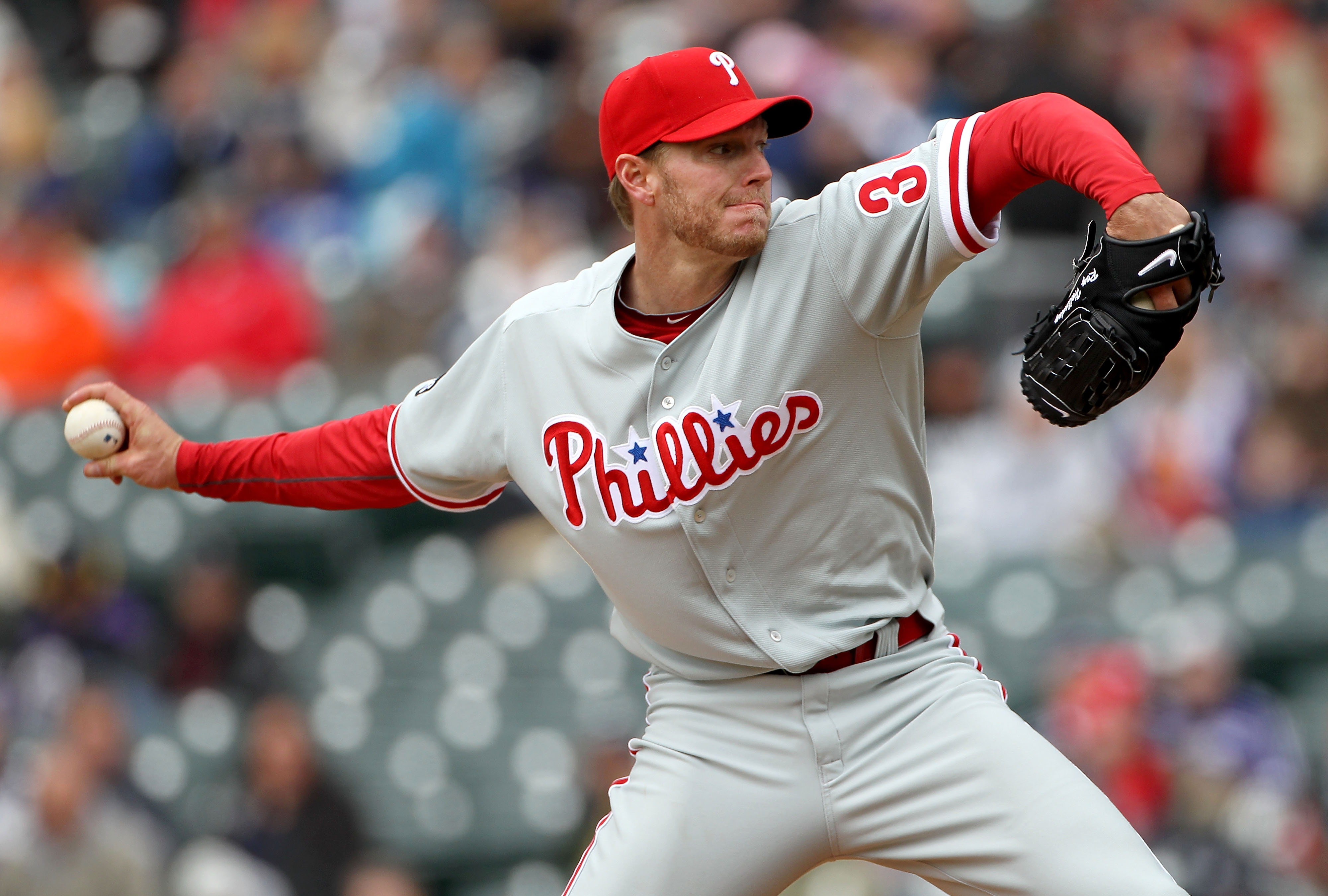 DENVER - MAY 12:  Starting pitcher Roy Halladay #34 of the Philadelphia Phillies delivers against the Colorado Rockies at Coors Field on May 12, 2010 in Denver, Colorado. The Rockies defeated the Phillies 4-3 in 10 innings.  (Photo by Doug Pensinger/Getty