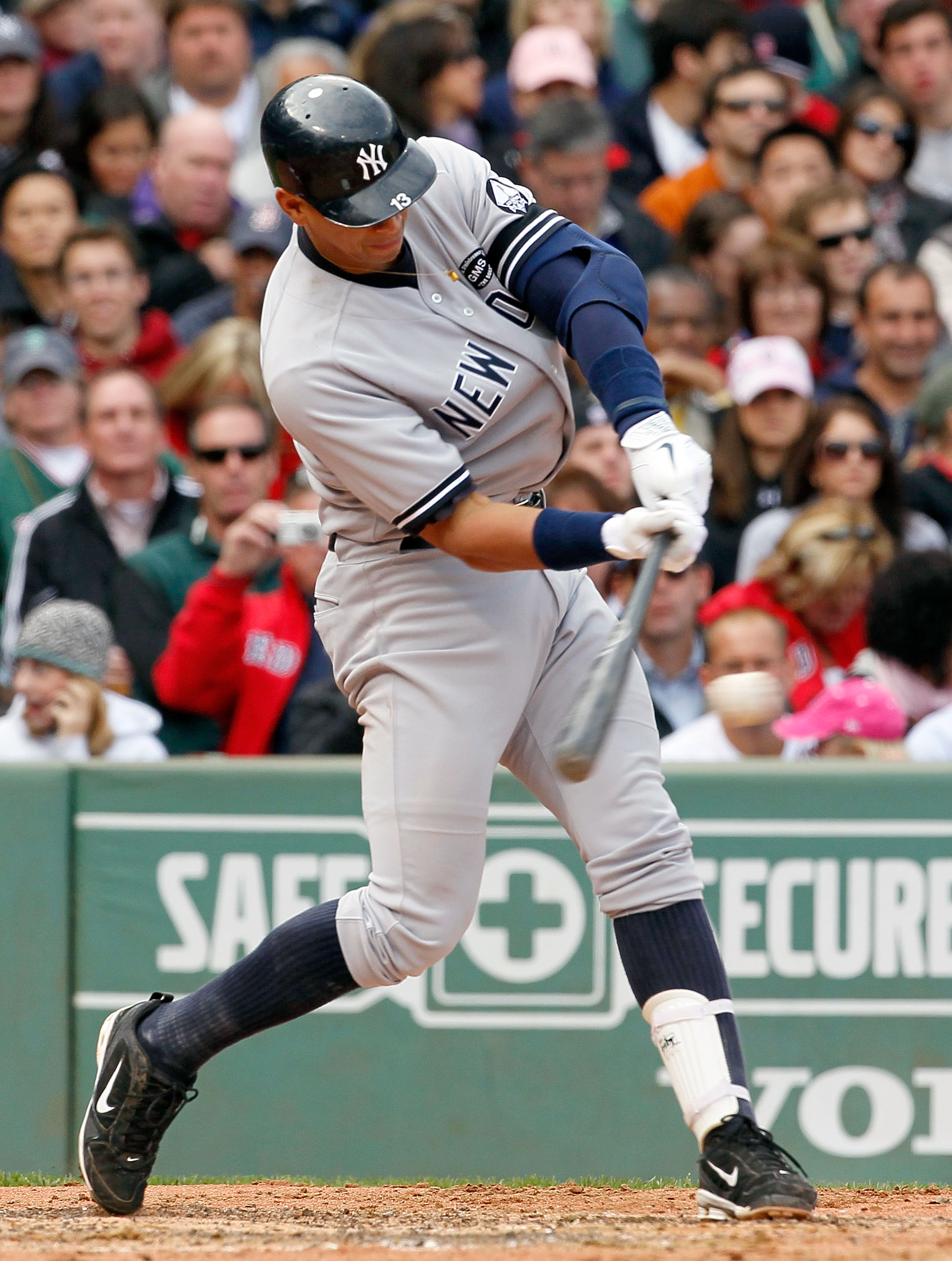 BOSTON - OCTOBER 3:  Alex Rodriguez #13 of the New York Yankees singles to knock in a run in the third inning against the Boston Red Sox at Fenway Park October 3, 2010 in Boston, Massachusetts. (Photo by Jim Rogash/Getty Images)