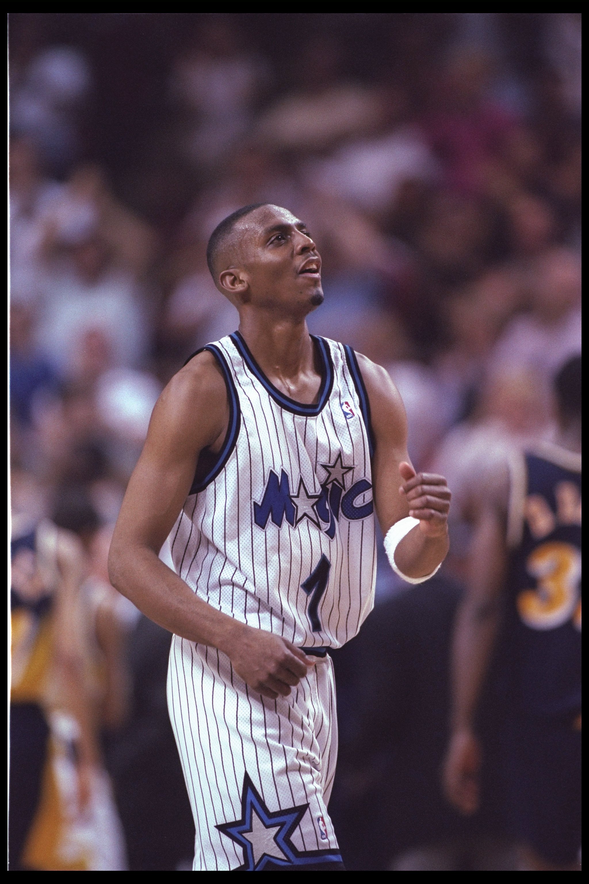 Guard Penny Hardaway of the Orlando Magic sinks the ball against
