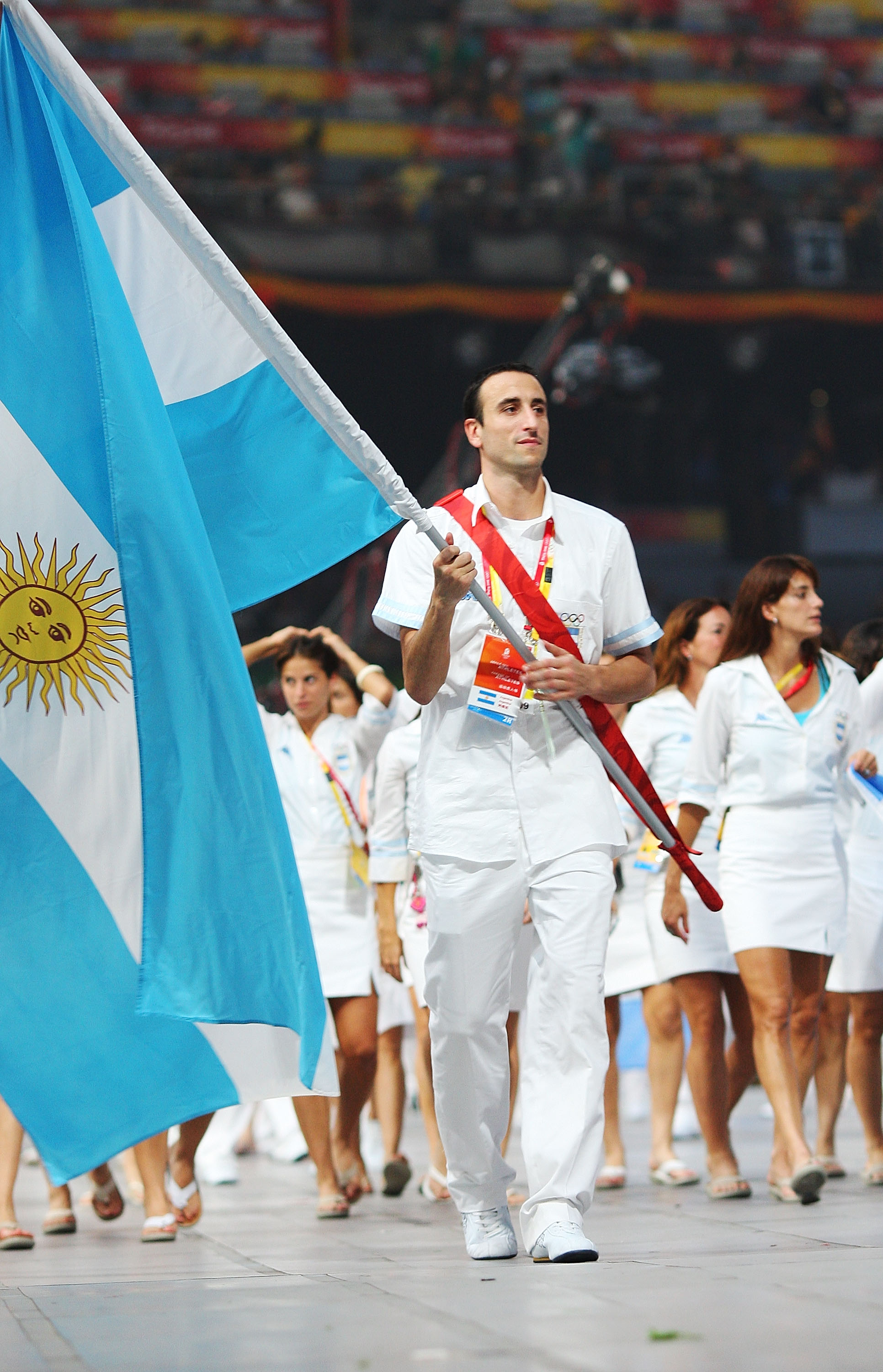 BEIJING - AUGUST 08:  Manu Ginobili of the Argentina Olympic men's basketball team carries his country's flag to lead out the delegation during the Opening Ceremony for the 2008 Beijing Summer Olympics at the National Stadium on August 8, 2008 in Beijing,