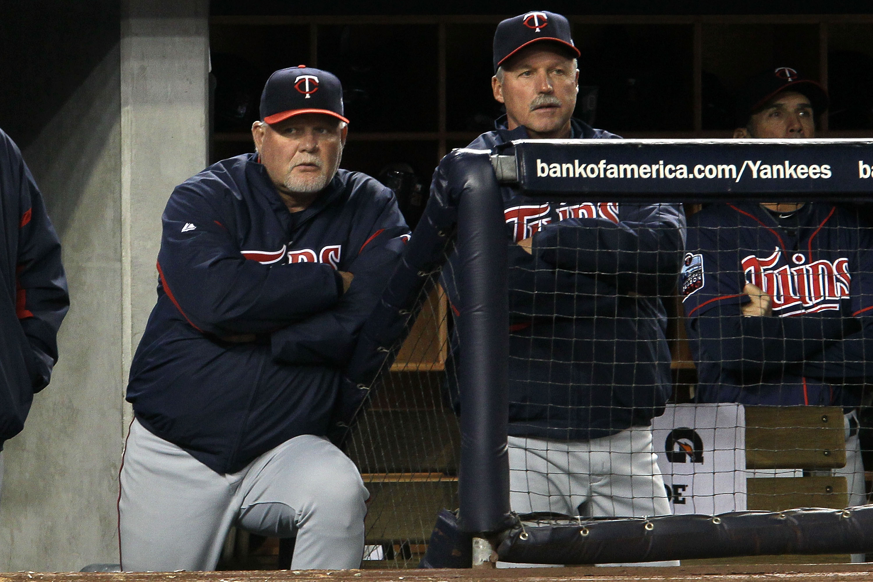 NEW YORK - OCTOBER 09:  Manager Ron Gardenhire (L) #35 of the Minnesota Twins looks on from the dugout late in the game against the New York Yankees  during Game Three of the ALDS part of the 2010 MLB Playoffs at Yankee Stadium on October 9, 2010 in the B