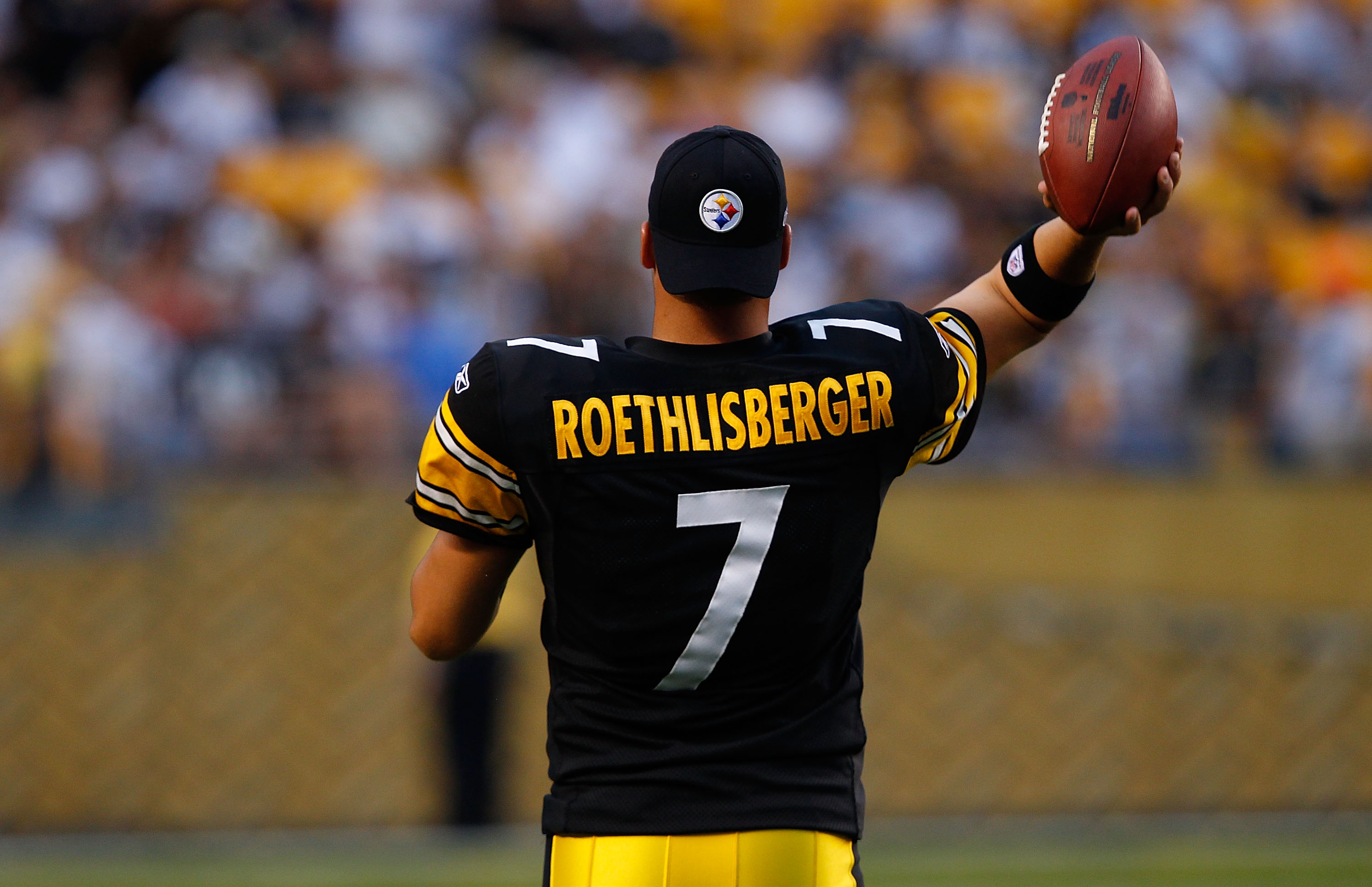 Cincinnati Bengals Michael Johnson holds on the jersey and sacks Pittsburgh  Steelers quarterback Ben Roethlisberger for a lost of eight yards in the  second quarter at Heinz Field in Pittsburgh, Pennsylvania on