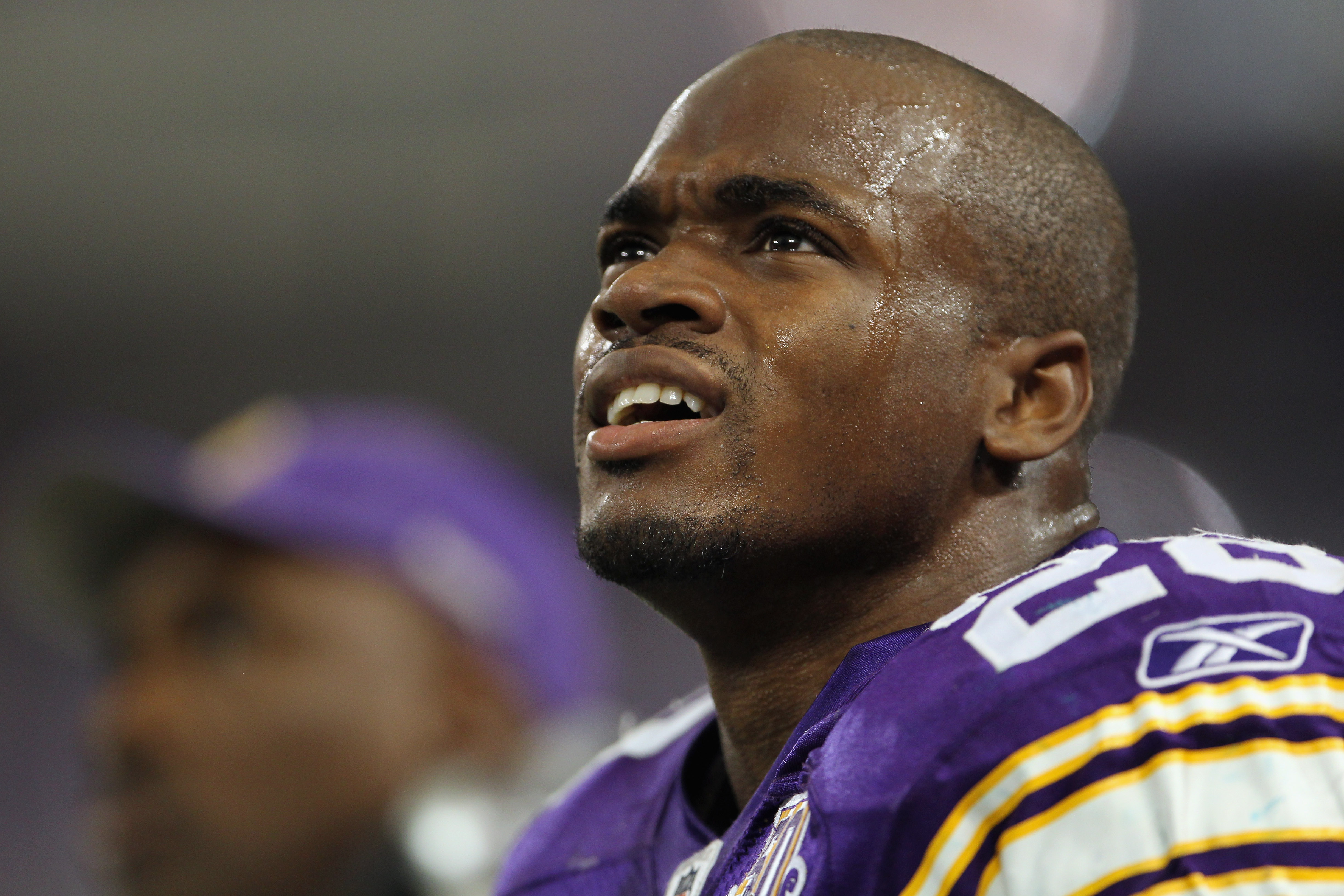 MINNEAPOLIS - SEPTEMBER 19:  Adrian Peterson #28 of the Minnesota Vikings watches a replay on the scoreboard during the game against the Miami Dolphins on September 19, 2010 at Hubert H. Humphrey Metrodome in Minneapolis, Minnesota.  (Photo by Jamie Squir