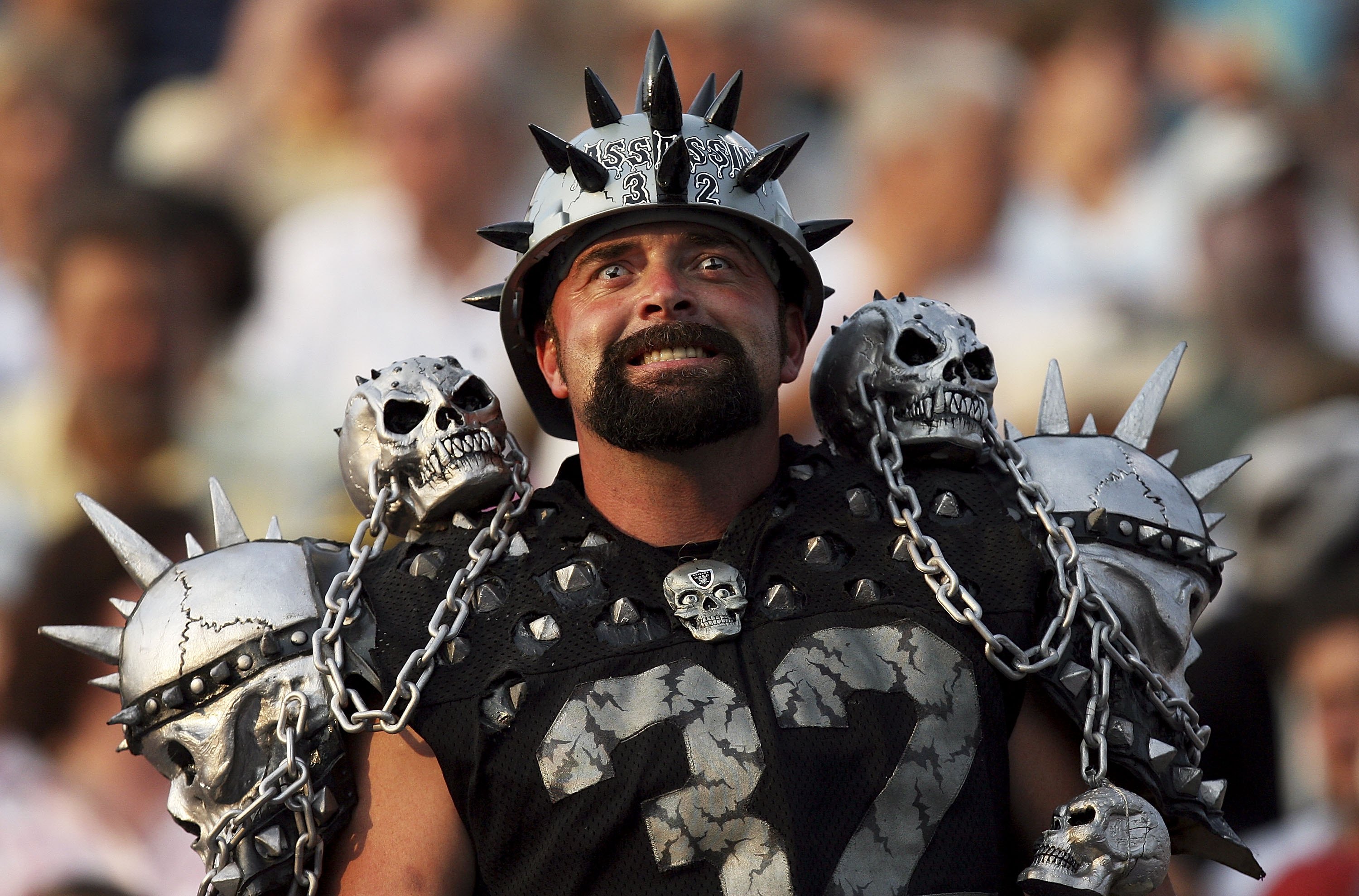 CANTON, OH - AUGUST 06:  A Raider fan gets ready before the Oakland Raiders take on the Philadelphia Eagles in the AFC-NFC Pro Football Hall of Fame Game at Fawcett Stadium on August 6, 2006 in Canton, Ohio.  (Photo by Doug Benc/Getty Images)