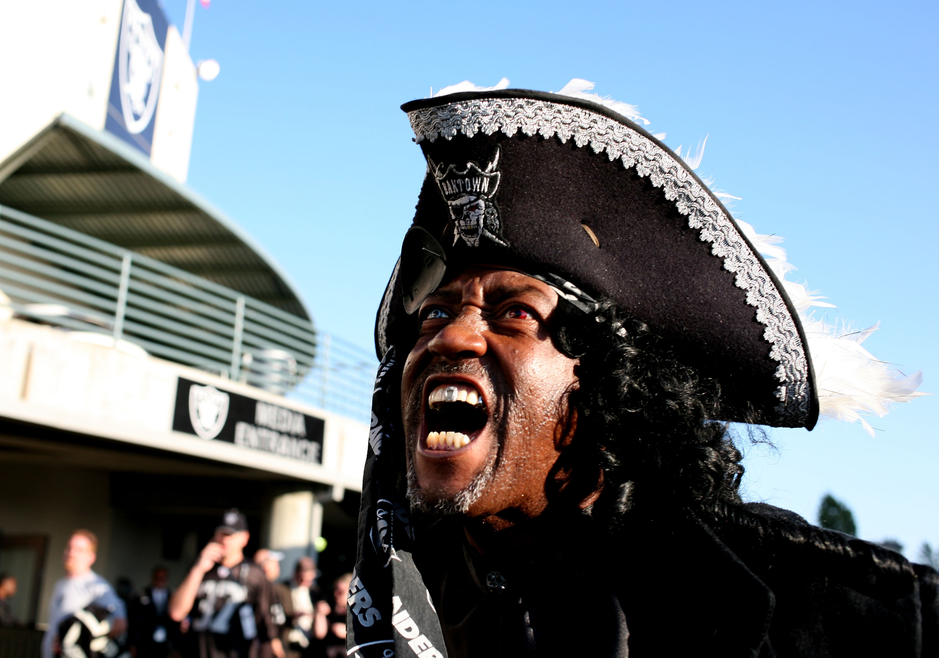 OAKLAND, CA - SEPTEMBER 08: An Oakland Raider fan walks around the stadium before the Denver Broncos and the Oakland Raiders NFL game at McAfee Coliseum on September 8, 2008 in Oakland, California.  (Photo by Jed Jacobsohn/Getty Images)