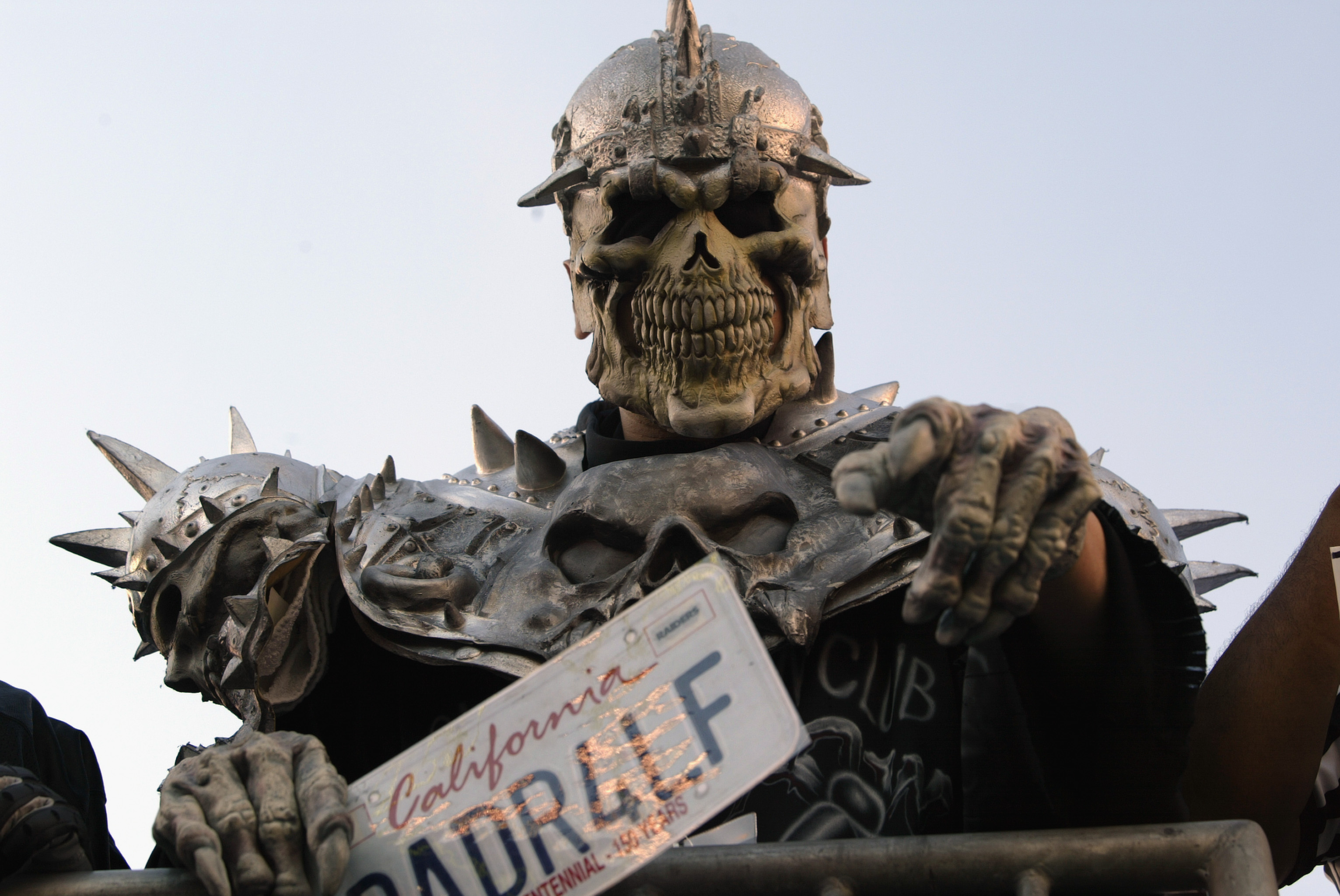 SAN DIEGO - JANUARY 26:  A fan of the Oakland Raiders wears a skull mask and armor while holding his 'RADR4LF' (Raider for Life) license plate during Super Bowl XXXVII against the Tampa Bay Buccaneers on January 26, 2003 at Qualcomm Stadium in San Diego, 