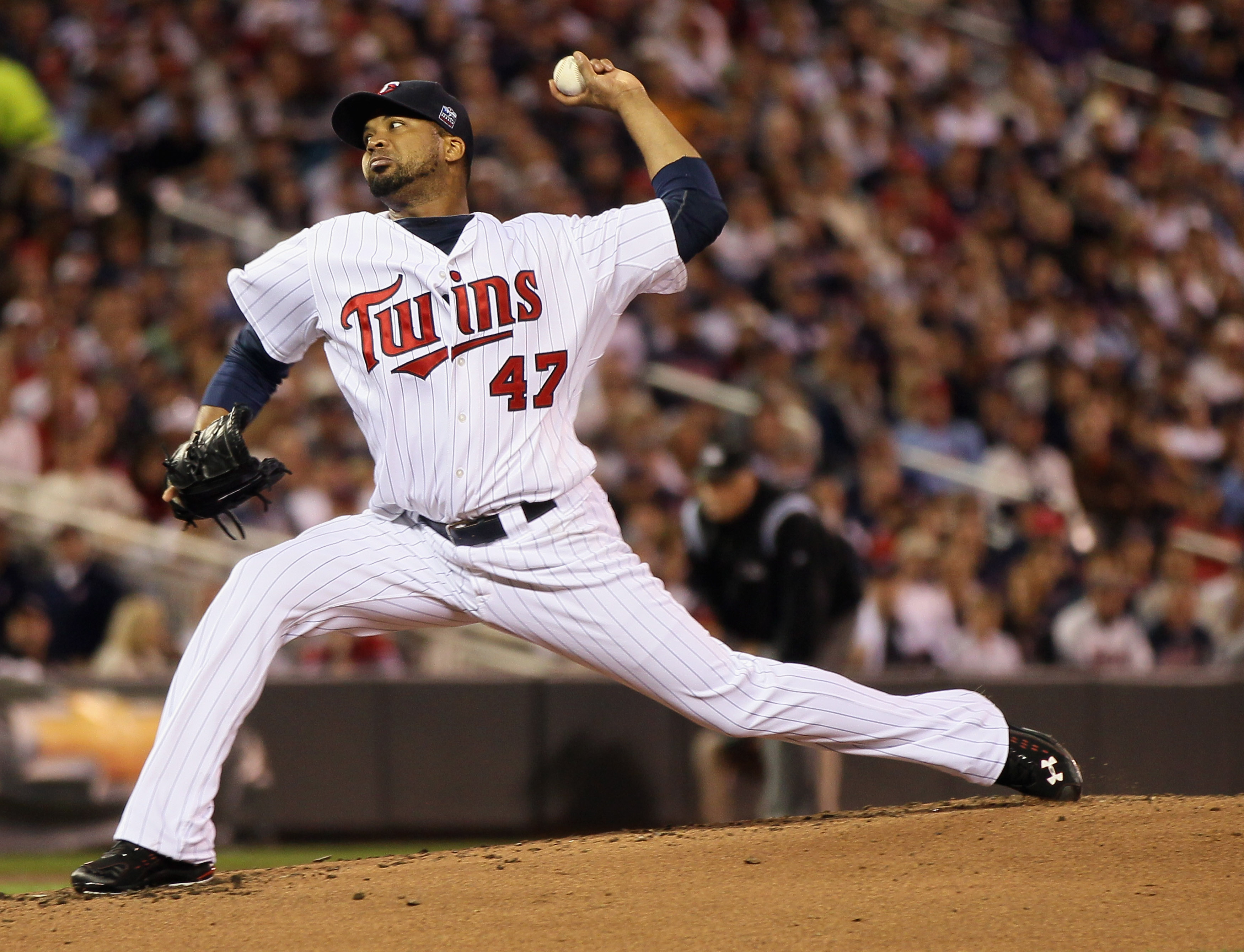 MINNEAPOLIS - OCTOBER 06: Francisco Liriano #47 of the Minnesota Twins delivers a pitch in the second inning against the New York Yankees during game one of the ALDS on October 6, 2010 at Target Field in Minneapolis, Minnesota.  (Photo by Elsa/Getty Image