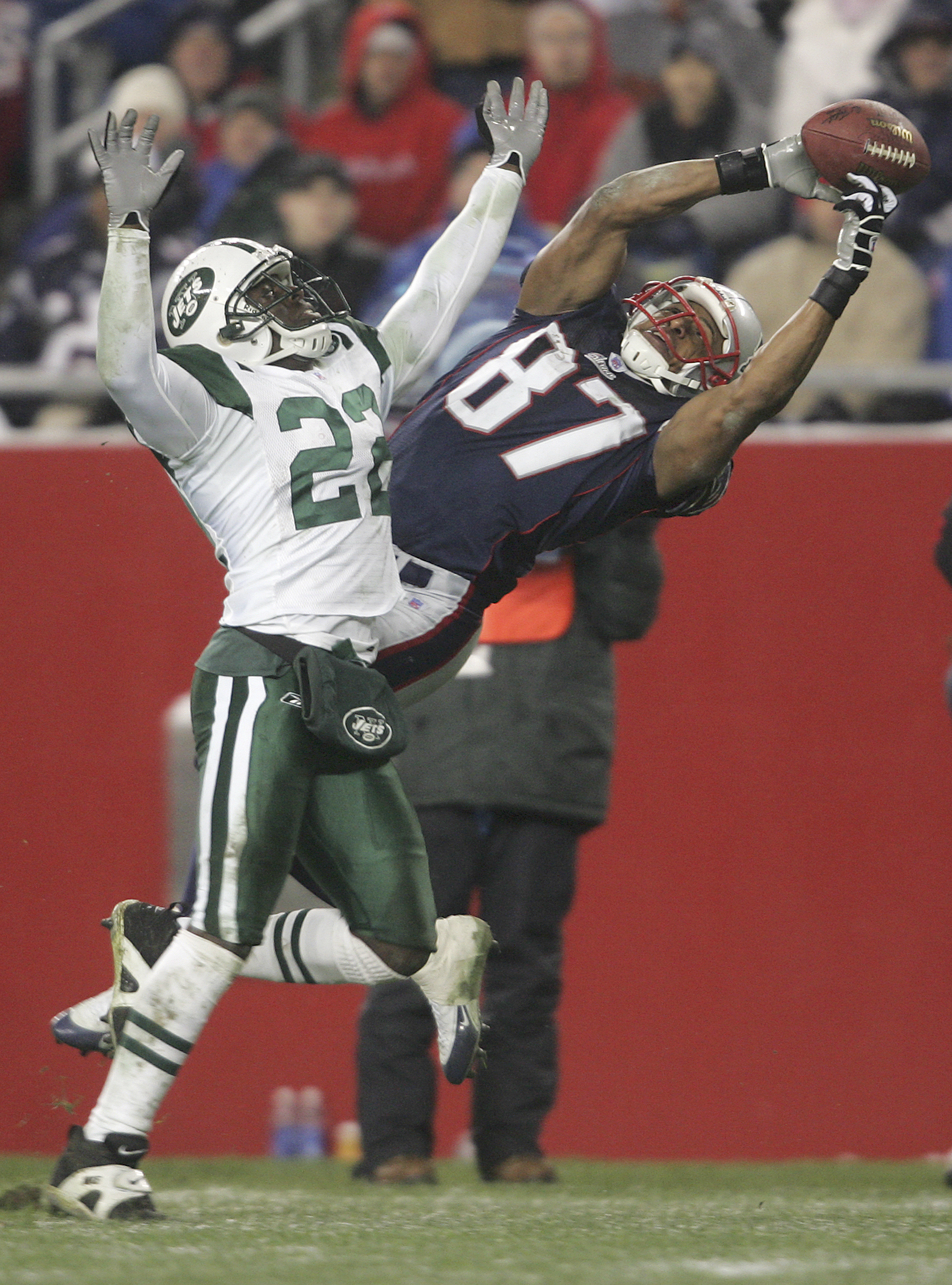 19 September 2010: New England Patriots wide receiver Randy Moss (81)  attempts a catch as New York Jets safety Jim Leonhard (36) defends during  the Jets 28-14 win over the Patriots at