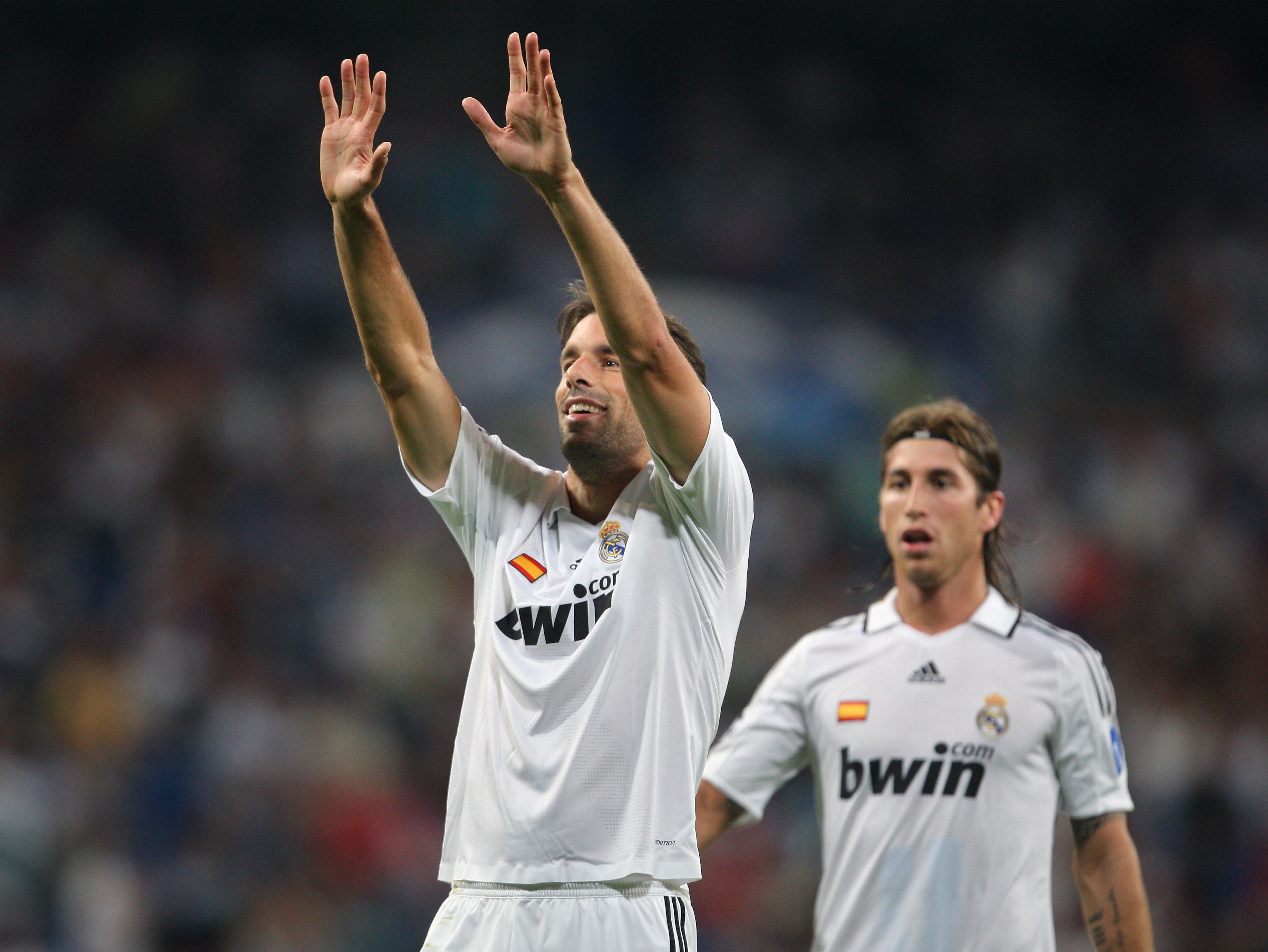 MADRID, SPAIN - SEPTEMBER 17:  Ruud van Nistelrooy of Real Madrid celebrates scoring the second goal backdropped by his teammate Sergio Ramos during the UEFA Champions League Group H match between Real Madrid and BATE Borisov at the Santiago Bernabeu stad
