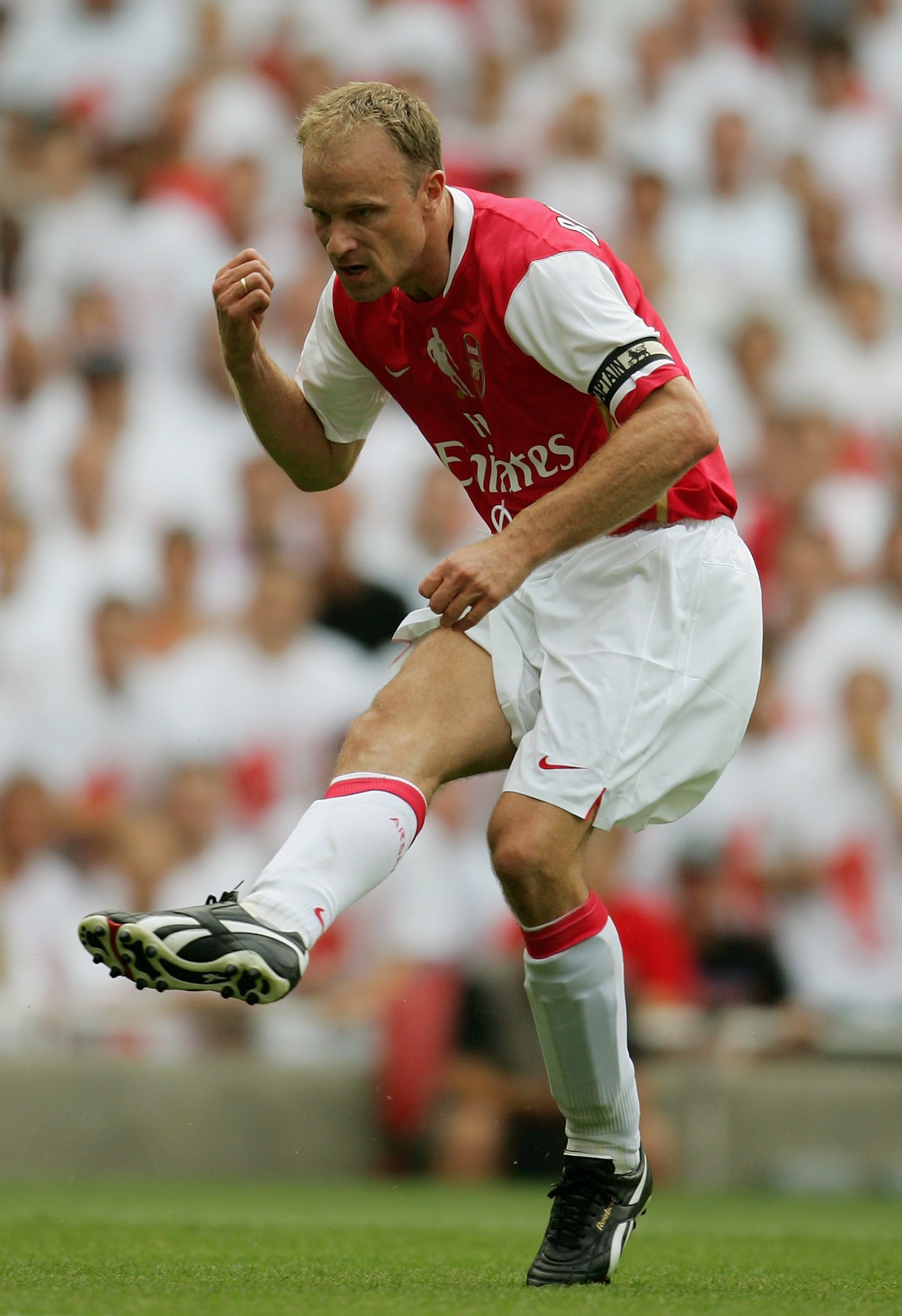 LONDON - JULY 22:  Dennis Bergkamp of Arsenal shoots on goal during the Dennis Bergkamp testimonial match between Arsenal and Ajax at the Emirates Stadium on July 22, 2006 in London, England.  (Photo by Jamie McDonald/Getty Images)