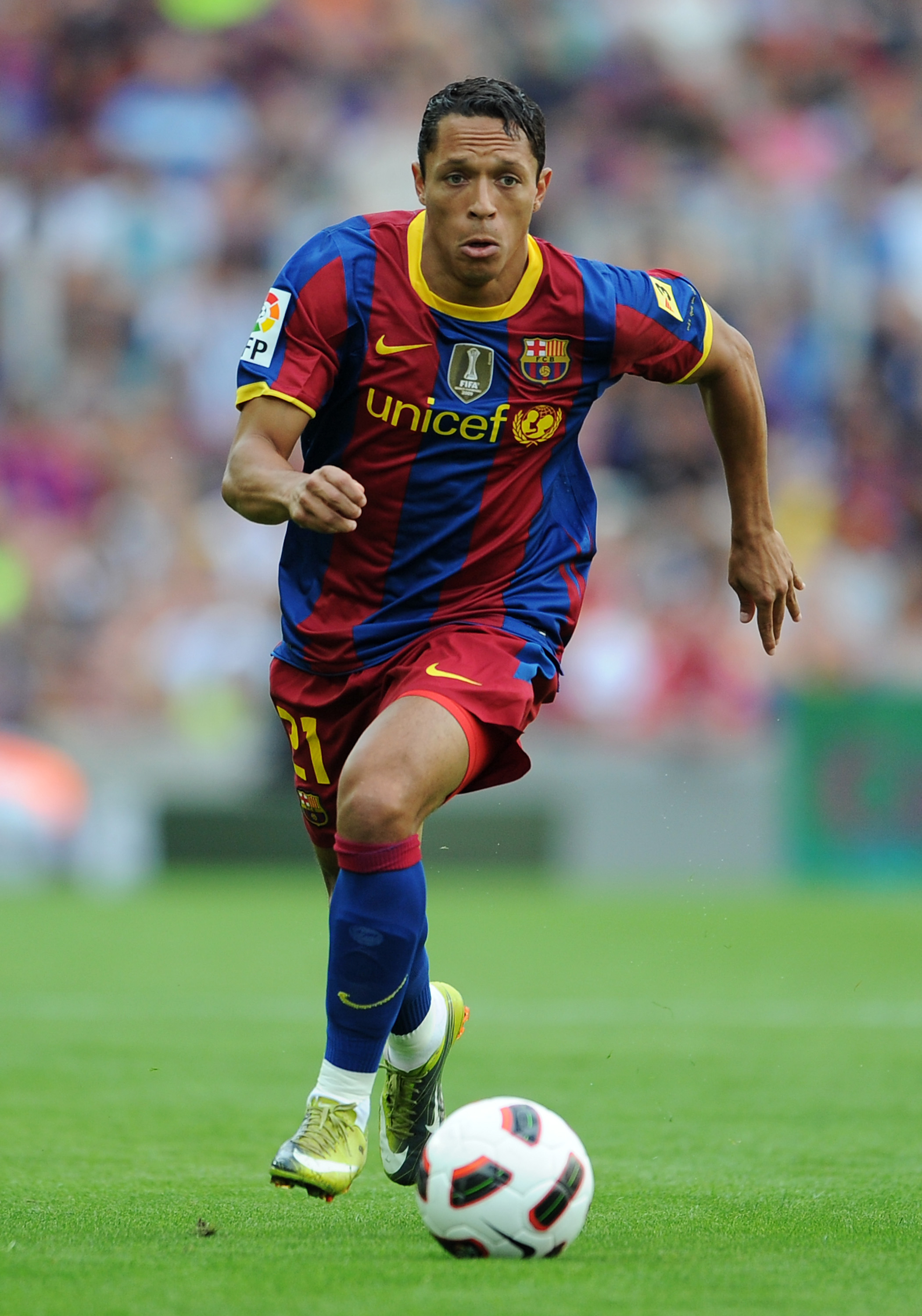 BARCELONA, SPAIN - SEPTEMBER 11:  Adriano of Barcelona runs with the ball during the La Liga match between Barcelona and Hercules at the Camp Nou stadium on September 11, 2010 in Barcelona, Spain. Barcelona lost the match 2-0.  (Photo by Jasper Juinen/Get