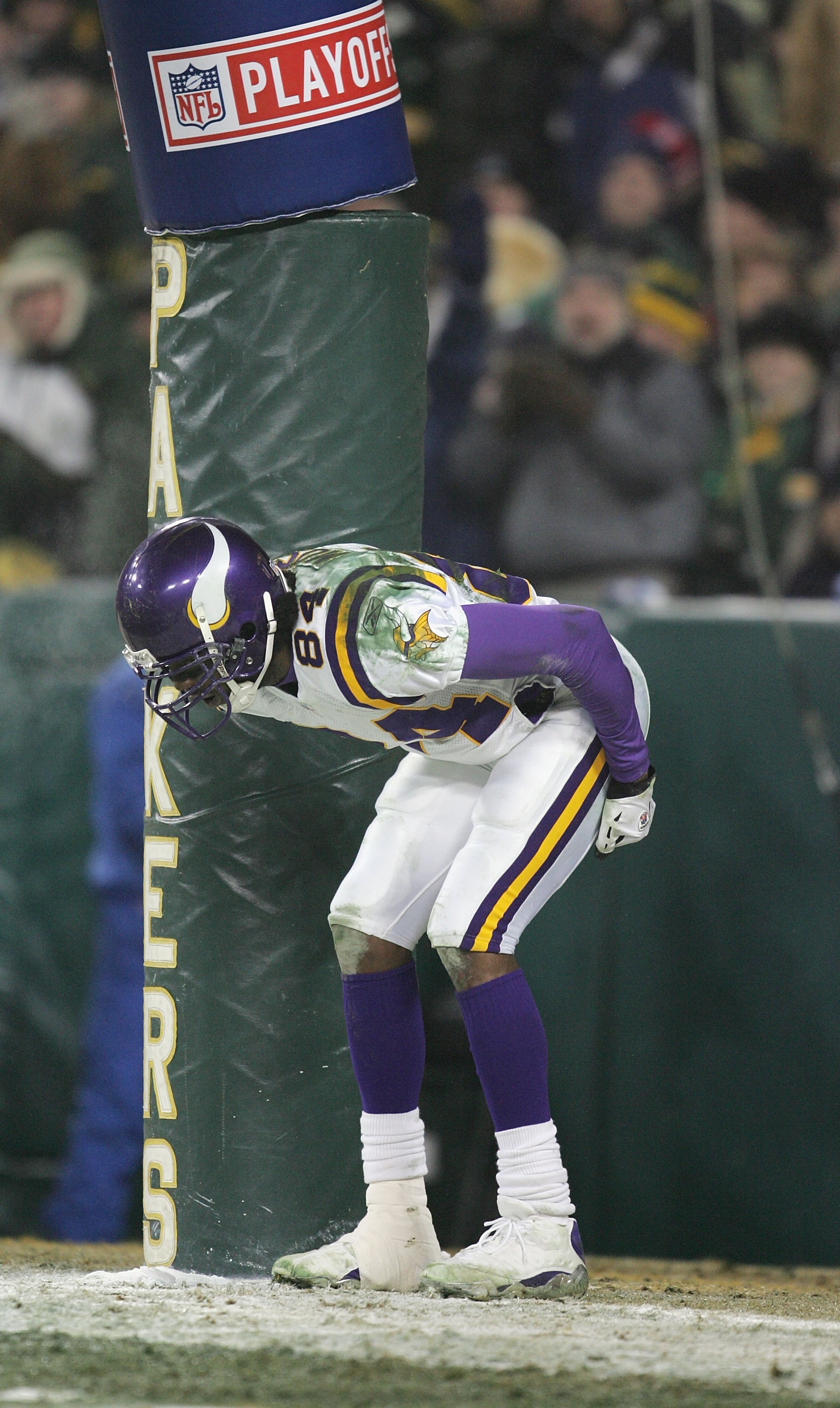 Wide receiver Randy Moss of the Minnesota Vikings takes a knee