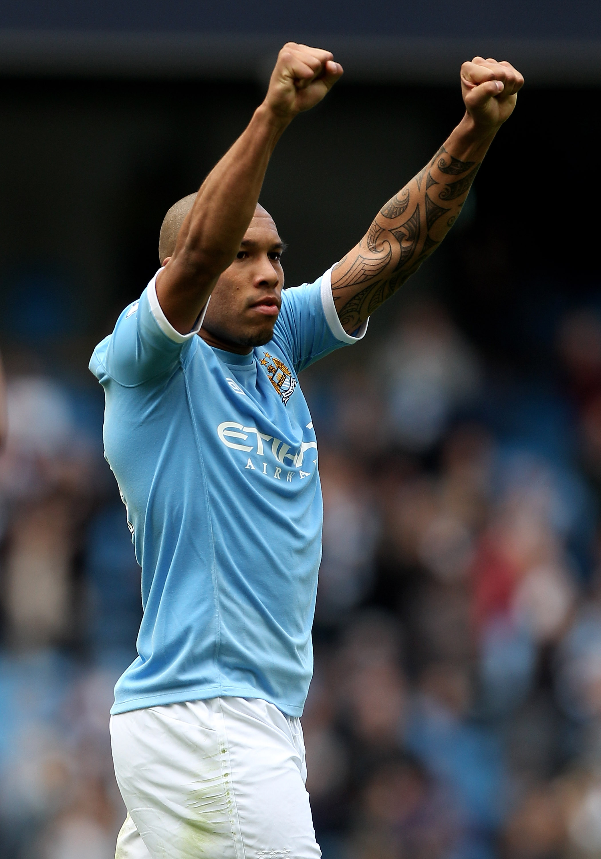 MANCHESTER, ENGLAND - SEPTEMBER 25:   Nigel de Jong of Manchester City celebrates at the end of the Barclays Premier League match between Manchester City and Chelsea at the City of Manchester Stadium on September 25, 2010 in Manchester, England. (Photo by