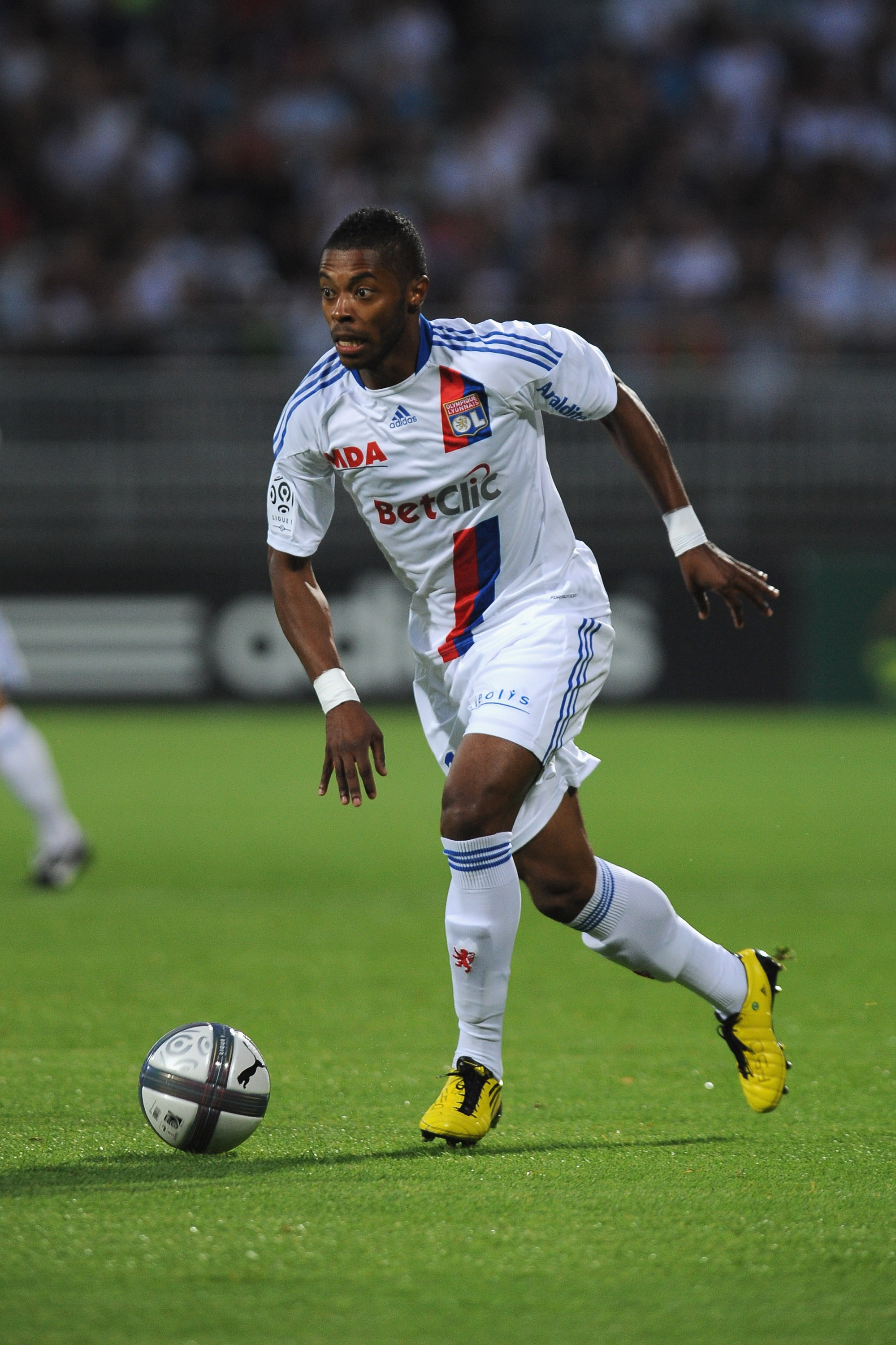LYON, FRANCE - AUGUST 07:  Michel Fernandes Bastos of Olympique Lyonnais in action during the Ligue 1 match between Olympique Lyonnais and AS Monaco FC at Gerland Stadium on August 7, 2010 in Lyon, France.  (Photo by Valerio Pennicino/Getty Images)
