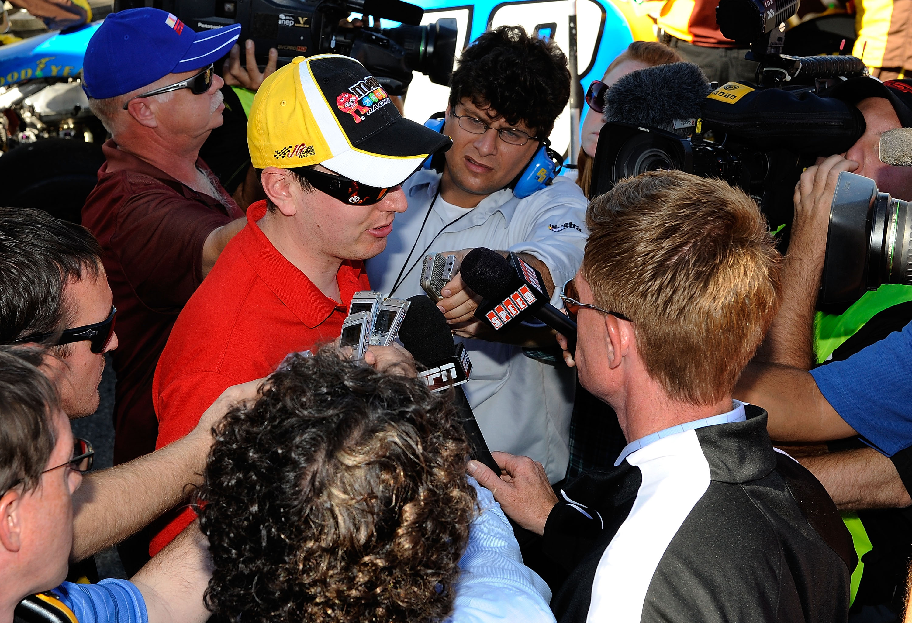 FONTANA, CA - OCTOBER 10:  Kyle Busch, driver of the #18 M&M'sToyota, speaks to the media after blowing a motor during the NASCAR Sprint Cup Series Pepsi Max 400 on October 10, 2010 in Fontana, California.  (Photo by Rusty Jarrett/Getty Images for NASCAR)
