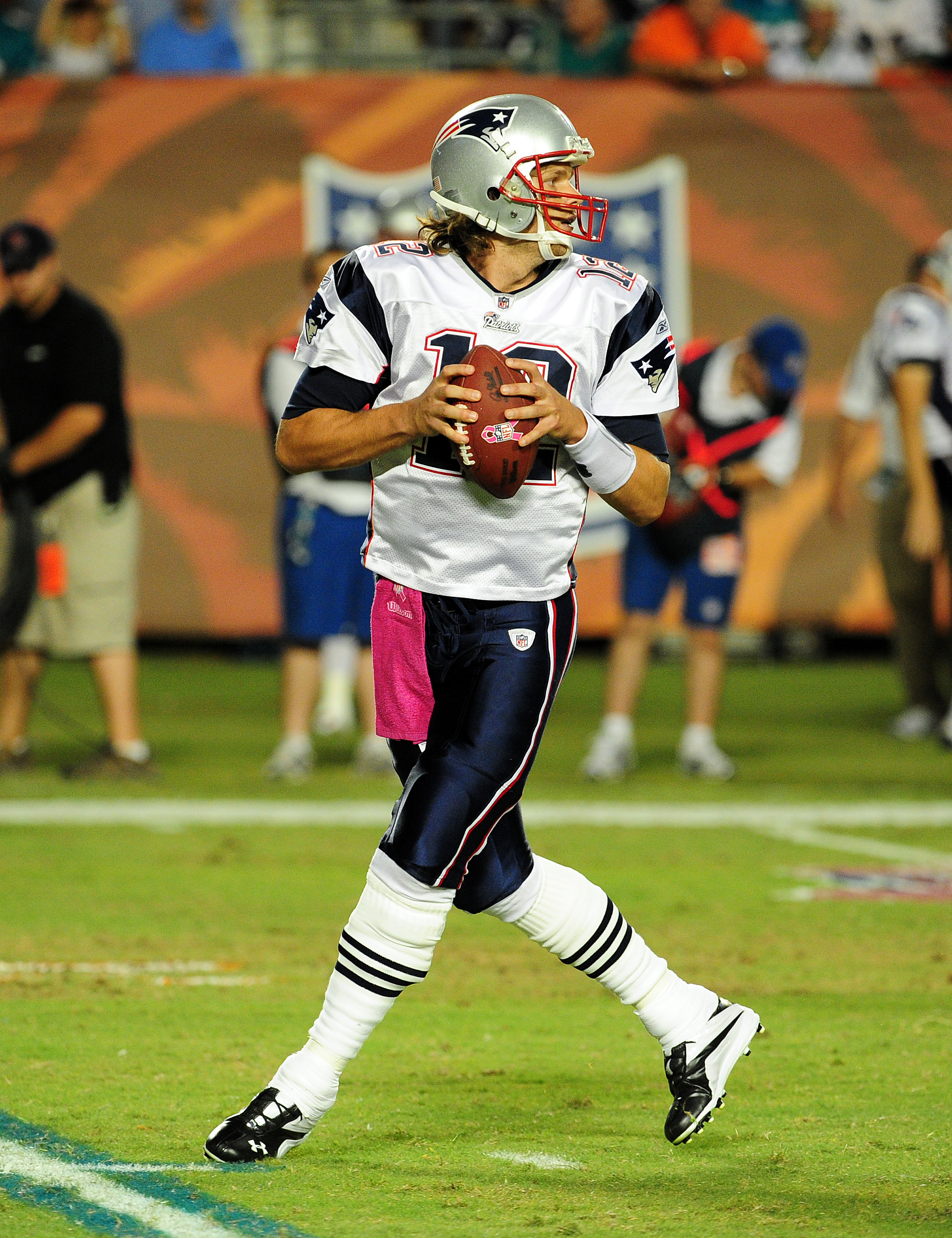 New England Patriots Randy Moss and Tom Brady talk on the sideline in the  fourth quarter of their game against the Miami Dolphins. The Patriots  defeated the Dolphins 49-28 at Dolphin Stadium