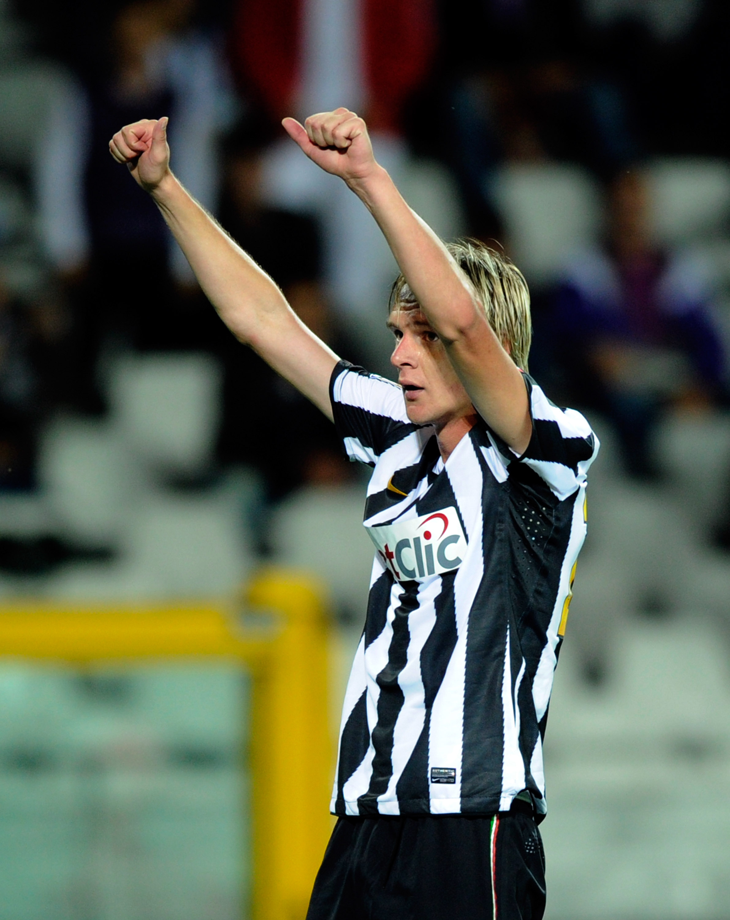 TURIN, ITALY - SEPTEMBER 26:  Milos Krasic of Juventus FC celebrates after the fourth goal during the Serie A match between Juventus and Cagliari at Olimpico Stadium on September 26, 2010 in Turin, Italy.  (Photo by Claudio Villa/Getty Images)
