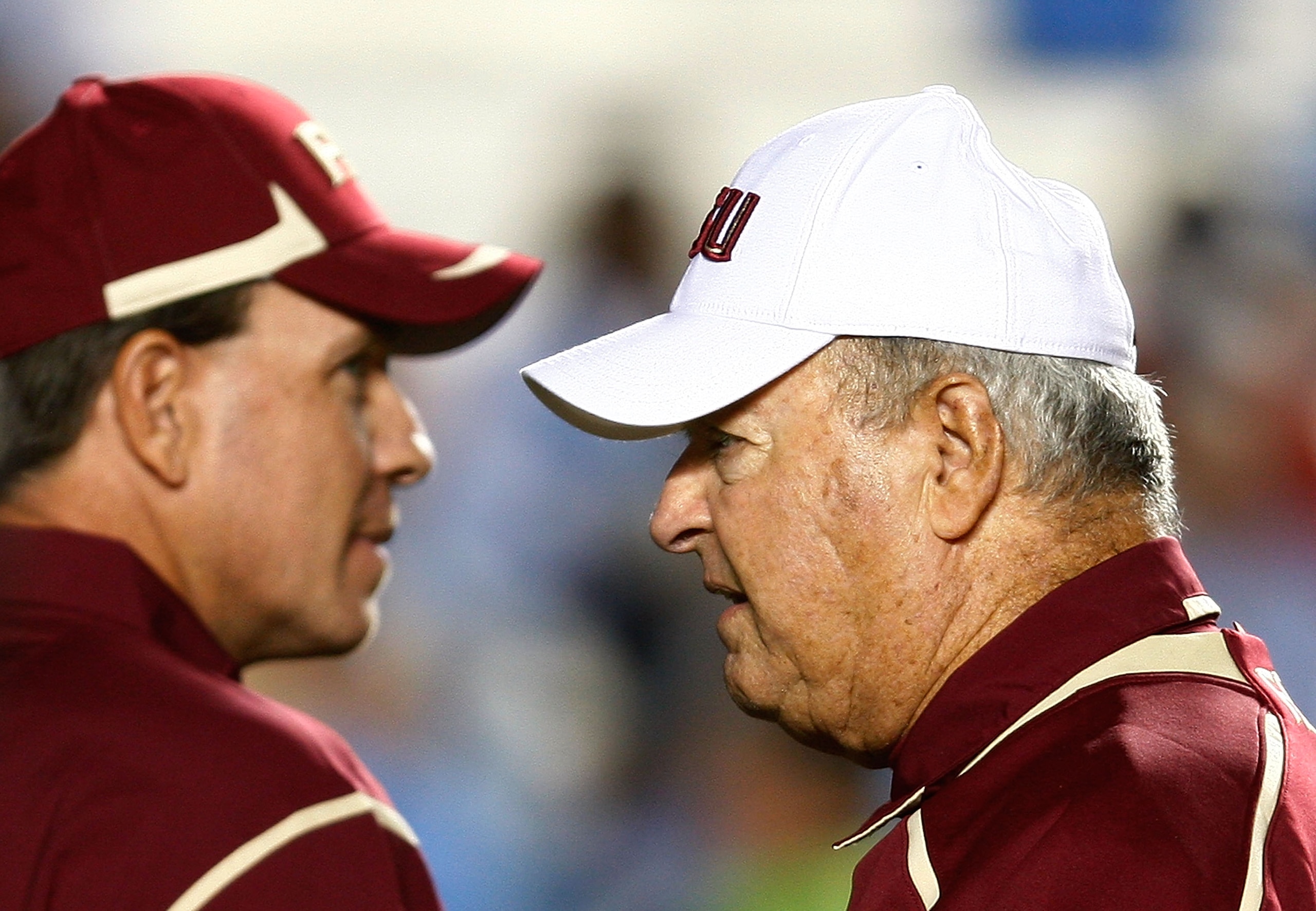 CHAPEL HILL, NC - OCTOBER 22:  Florida State Seminoles Head Coach Bobby Bowden, (R) and Offensive Coordinator Jimbo Fisher watch the pregame action prior to the start of the game against the North Carolina Tar Heels at Kenan Stadium on October 22, 2009 in