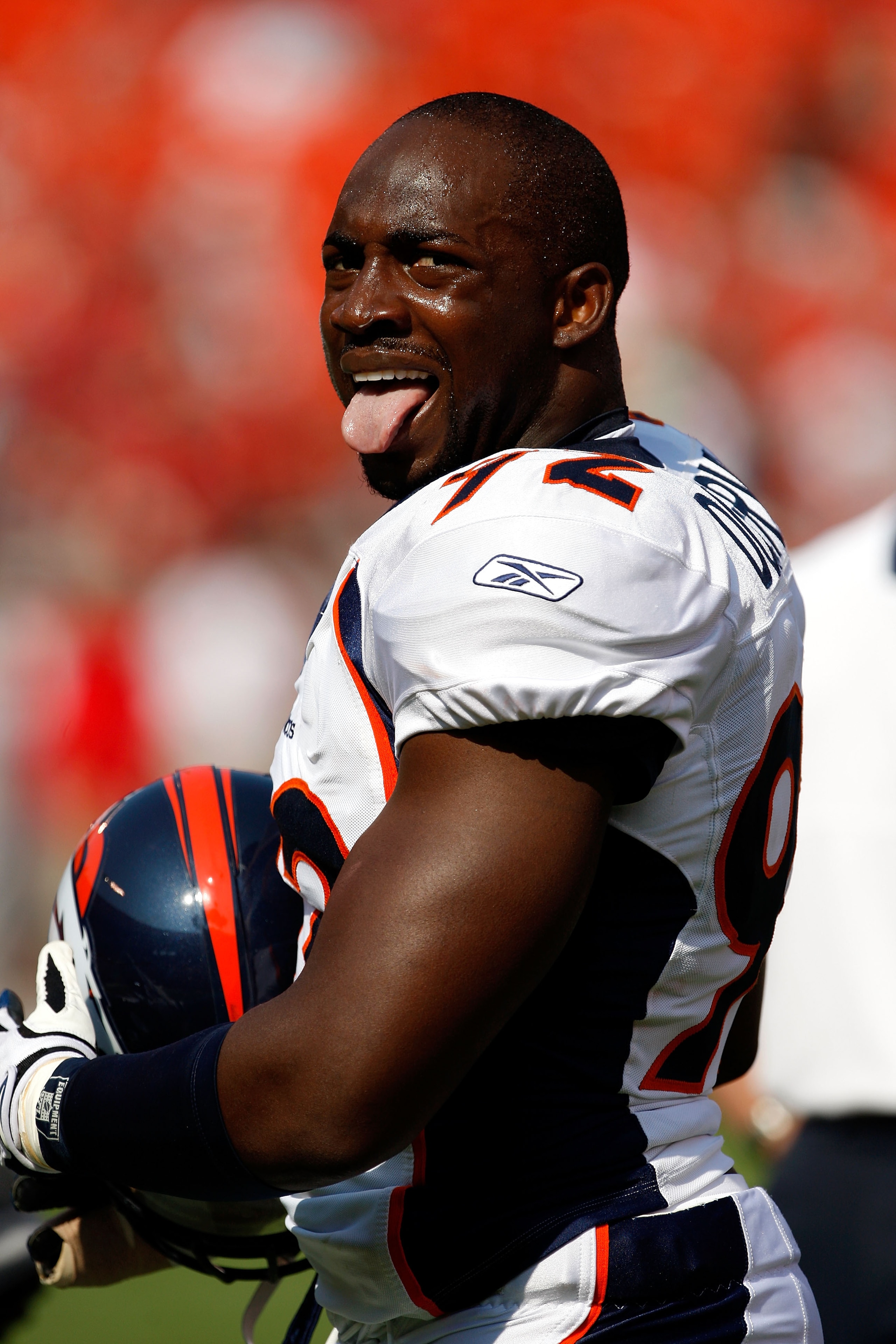 KANSAS CITY, MO - SEPTEMBER 28: Elvis Dumervil #92 of the Denver Broncos interacts with fans prior to the start of the game against the Kansas City Chiefs on September 28, 2008 at Arrowhead Stadium in Kansas City, Missouri. (Photo by Jamie Squire/Getty KANSAS CITY, MO - SEPTEMBER 28: Elvis Dumervil #92 of the Denver Broncos interacts with fans prior to the start of the game against the Kansas City Chiefs on September 28, 2008 at Arrowhead Stadium in Kansas City, Missouri. (Photo by Jamie Squire/Getty