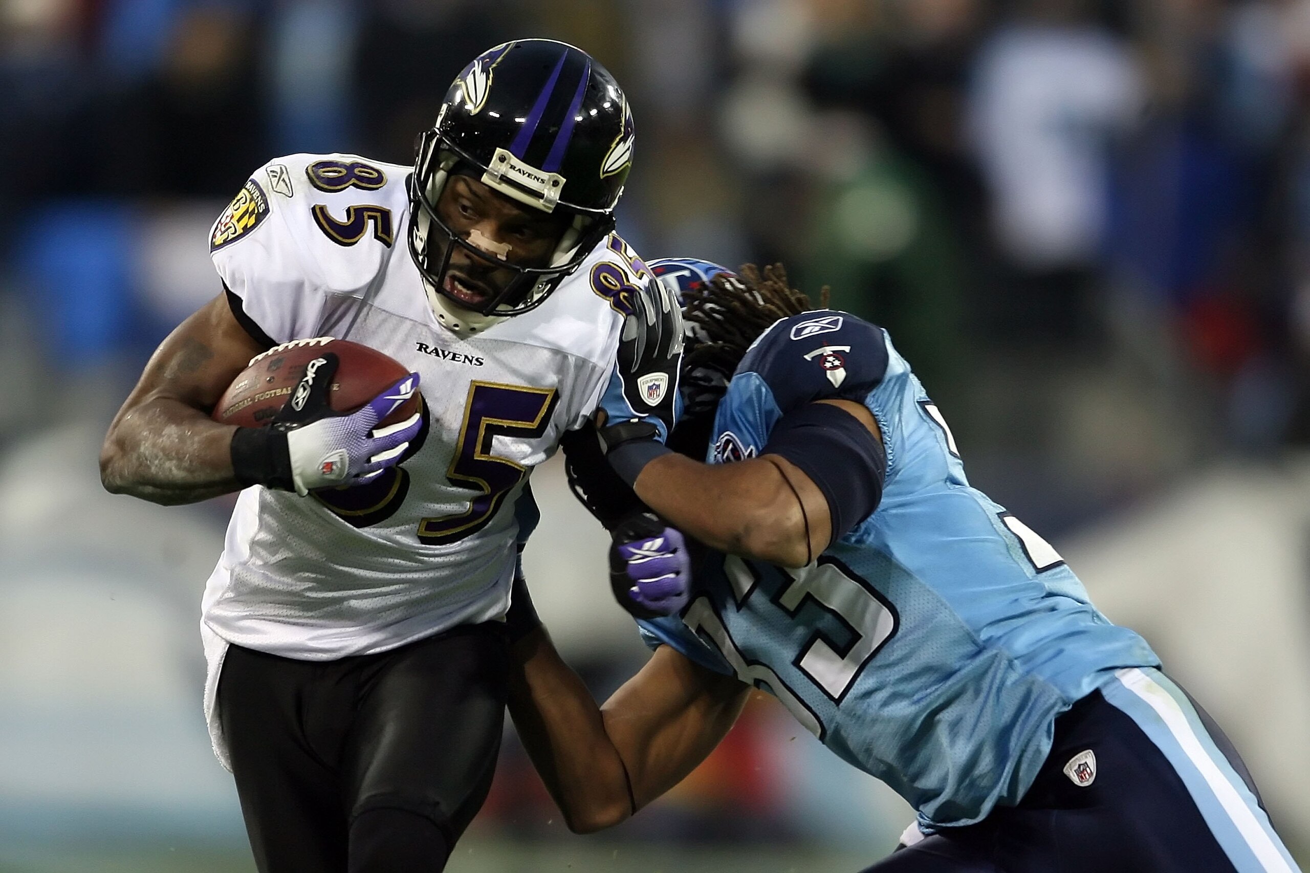NASHVILLE, TN - JANUARY 10: Wide receiver Derrick Mason #85 of the Baltimore Ravens is hit by safety Michael Griffin #33 of the Tennessee Titans during the AFC Divisional Playoff Game on January 10, 2009 at LP Field in Nashville, Tennessee. (Photo by An NASHVILLE, TN - JANUARY 10: Wide receiver Derrick Mason #85 of the Baltimore Ravens is hit by safety Michael Griffin #33 of the Tennessee Titans during the AFC Divisional Playoff Game on January 10, 2009 at LP Field in Nashville, Tennessee. (Photo by An