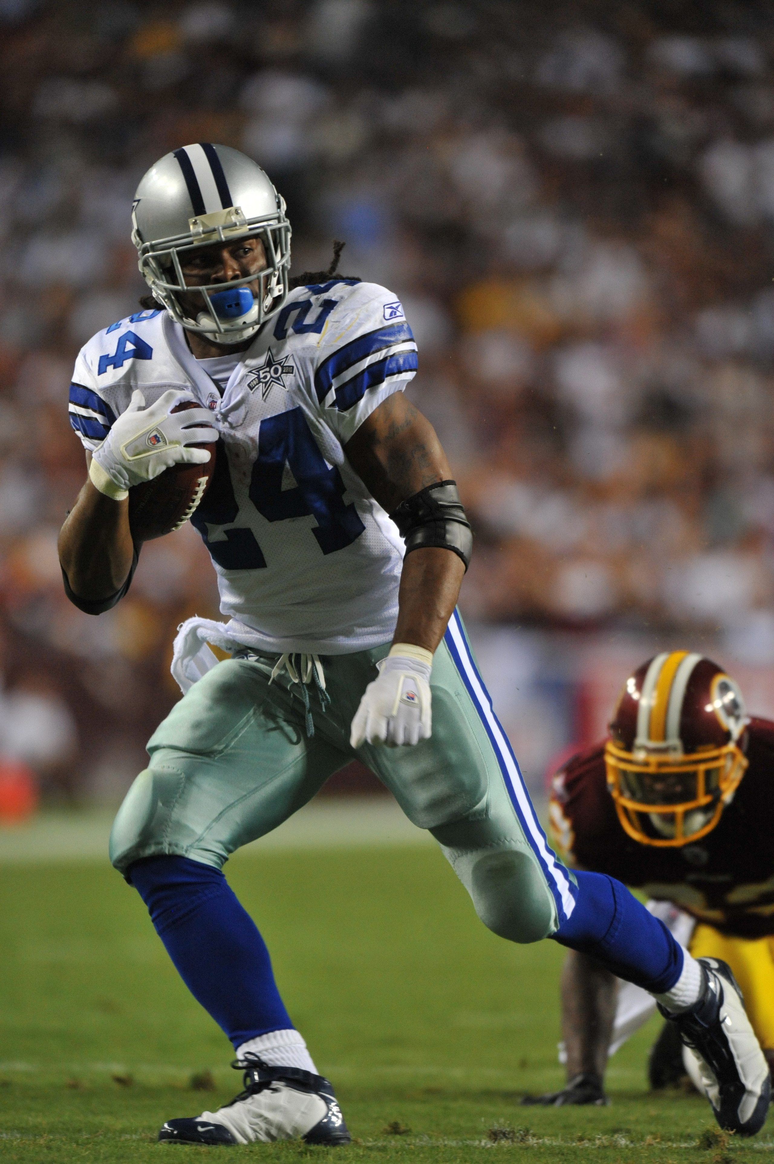 LANDOVER - SEPTEMBER 12: Marion Barber #24 of the Dallas Cowboys runs the ball during the NFL season opener against the Washington Redskins at FedExField on September 12, 2010 in Landover, Maryland. The Redskins defeated the Cowboys 13-7. (Photo by Larry LANDOVER - SEPTEMBER 12: Marion Barber #24 of the Dallas Cowboys runs the ball during the NFL season opener against the Washington Redskins at FedExField on September 12, 2010 in Landover, Maryland. The Redskins defeated the Cowboys 13-7. (Photo by Larry