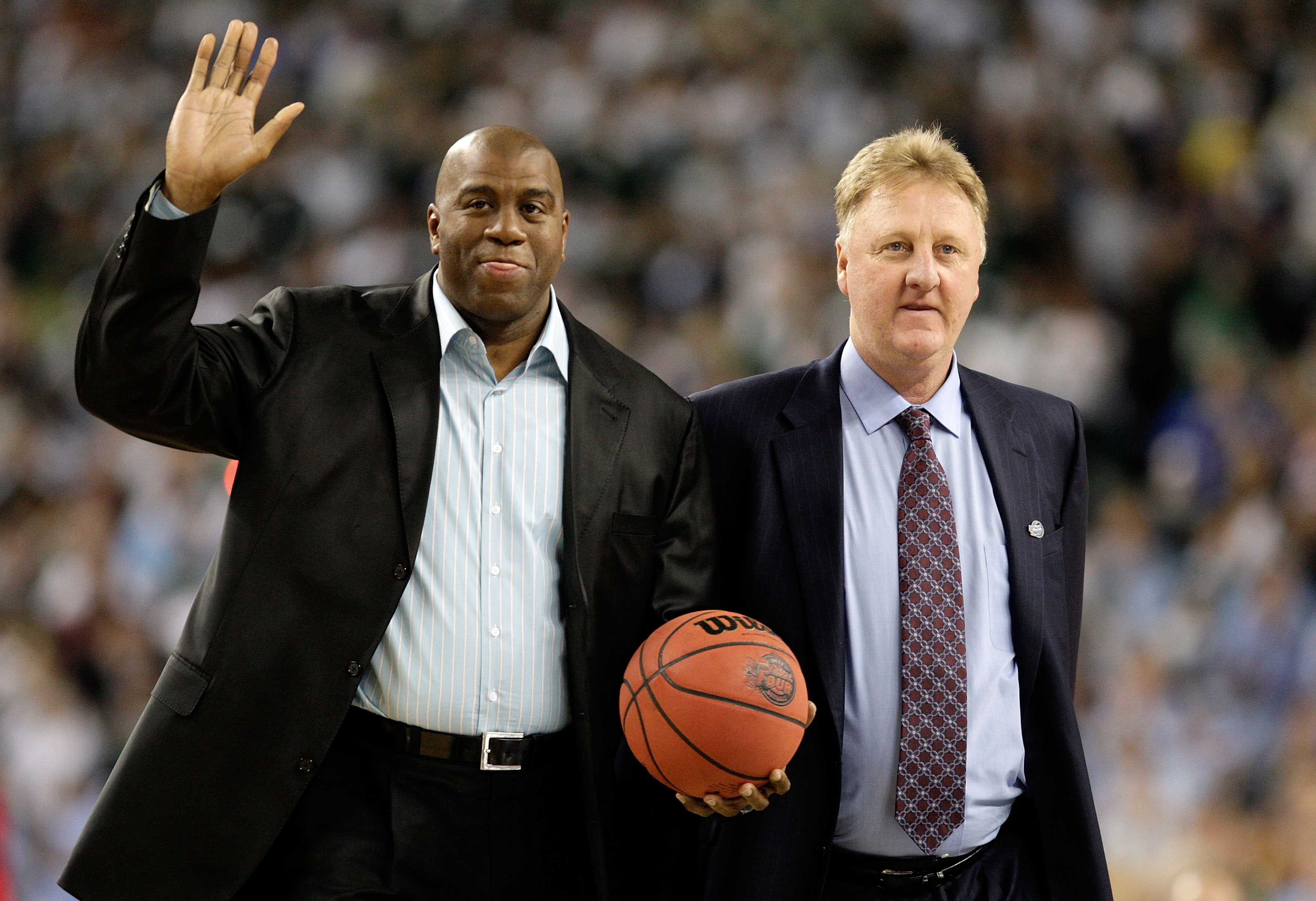 DETROIT - APRIL 06:  Larry Bird (R) and Earvin 'Magic' Johnson walk on the court to be honored for the 30th anniversary of their match up in 1979 NCAA Championship Game between Indiana State and Michigan State prior to the Michigan State Spartans playing