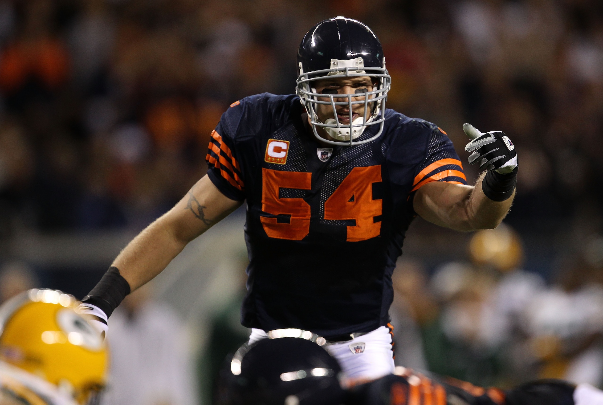 CHICAGO - SEPTEMBER 27: Brian Urlacher #54 of the Chicago Bears gestures at the line of scrimmage against the Green Bay Packers at Soldier Field on September 27, 2010 in Chicago, Illinois. (Photo by Jonathan Daniel/Getty Images) CHICAGO - SEPTEMBER 27: Brian Urlacher #54 of the Chicago Bears gestures at the line of scrimmage against the Green Bay Packers at Soldier Field on September 27, 2010 in Chicago, Illinois. (Photo by Jonathan Daniel/Getty Images)