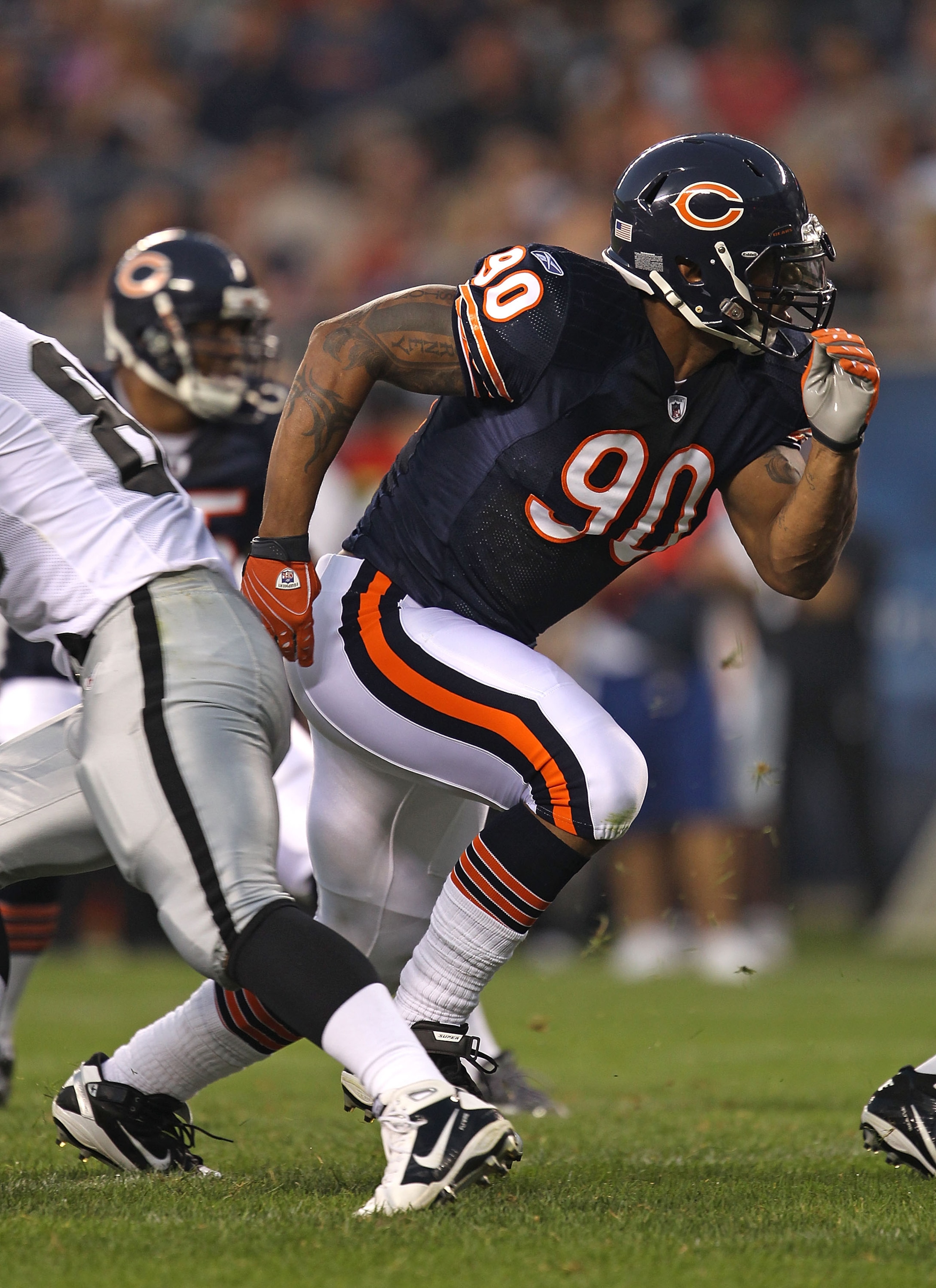 CHICAGO - AUGUST 21: Julius Peppers #90 of the Chicago Bears rushes against the Oakland Raiders during a preseason game at Soldier Field on August 21, 2010 in Chicago, Illinois. The Radiers defeated the Bears 32-17. (Photo by Jonathan Daniel/Getty Images) CHICAGO - AUGUST 21: Julius Peppers #90 of the Chicago Bears rushes against the Oakland Raiders during a preseason game at Soldier Field on August 21, 2010 in Chicago, Illinois. The Radiers defeated the Bears 32-17. (Photo by Jonathan Daniel/Getty Images)
