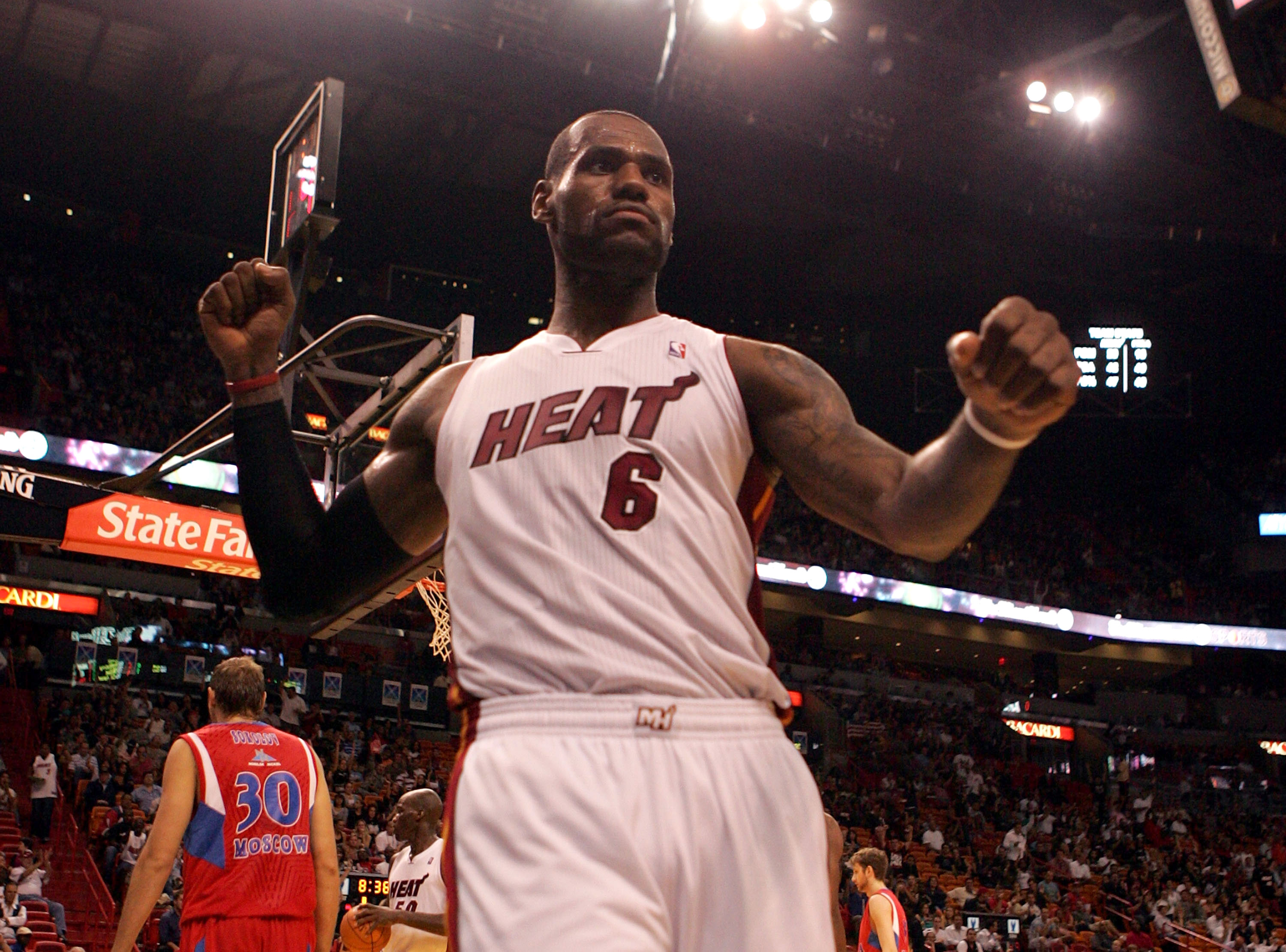 MIAMI - OCTOBER 12:  Forward LeBron James #6 of the Miami Heat celebrates against CSKA Moskow on October 12, 2010 in Miami, Florida.  NOTE TO USER: User expressly acknowledges and agrees that, by downloading and or using this photograph, User is consentin