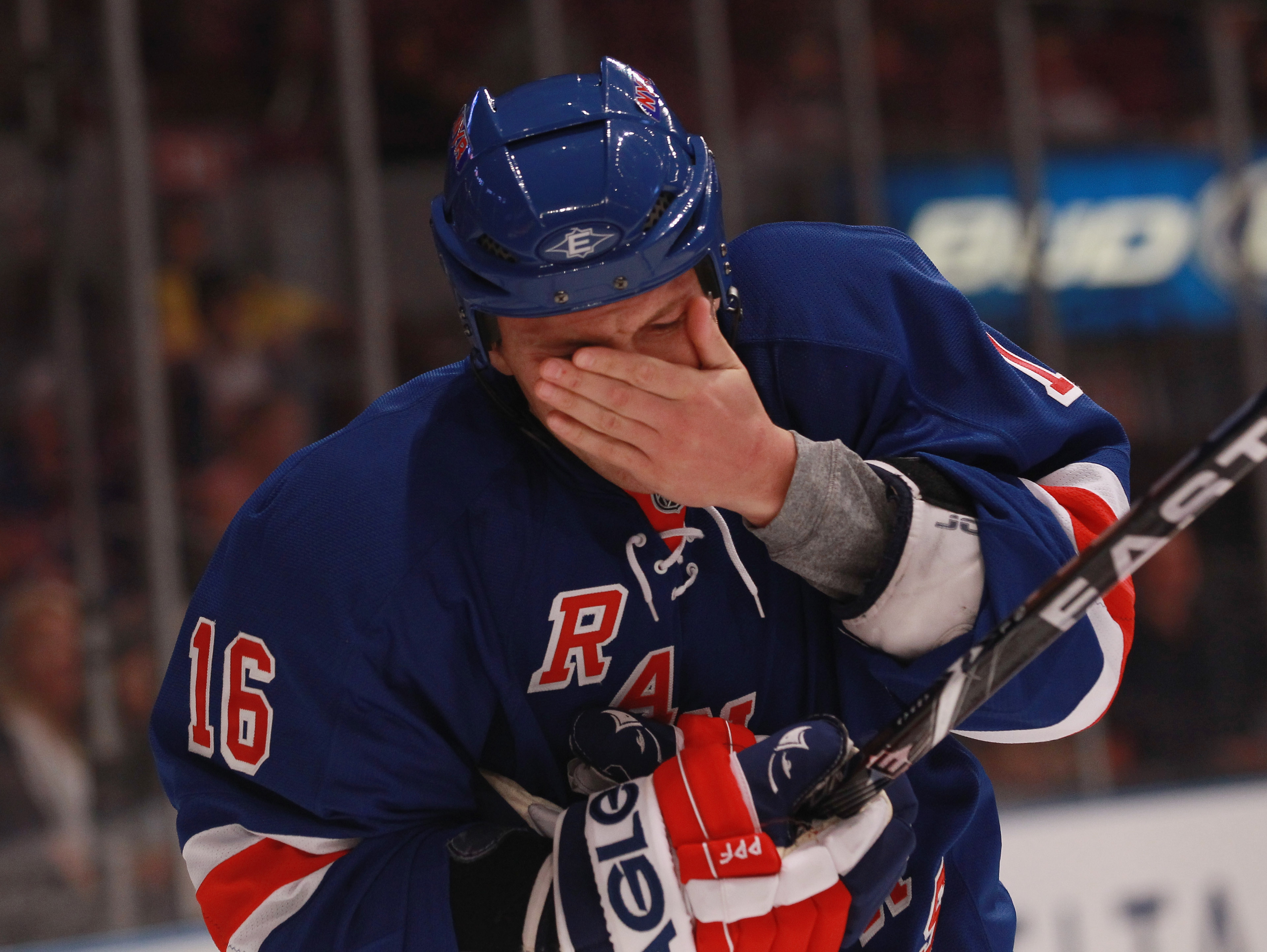 NEW YORK - SEPTEMBER 29: Sean Avery #16 of the New York Rangers checks for further injury after being hit by a stick in his game against the Detroit Red Wings at Madison Square Garden on September 29, 2010 in New York City. (Photo by Bruce Bennett/Getty I