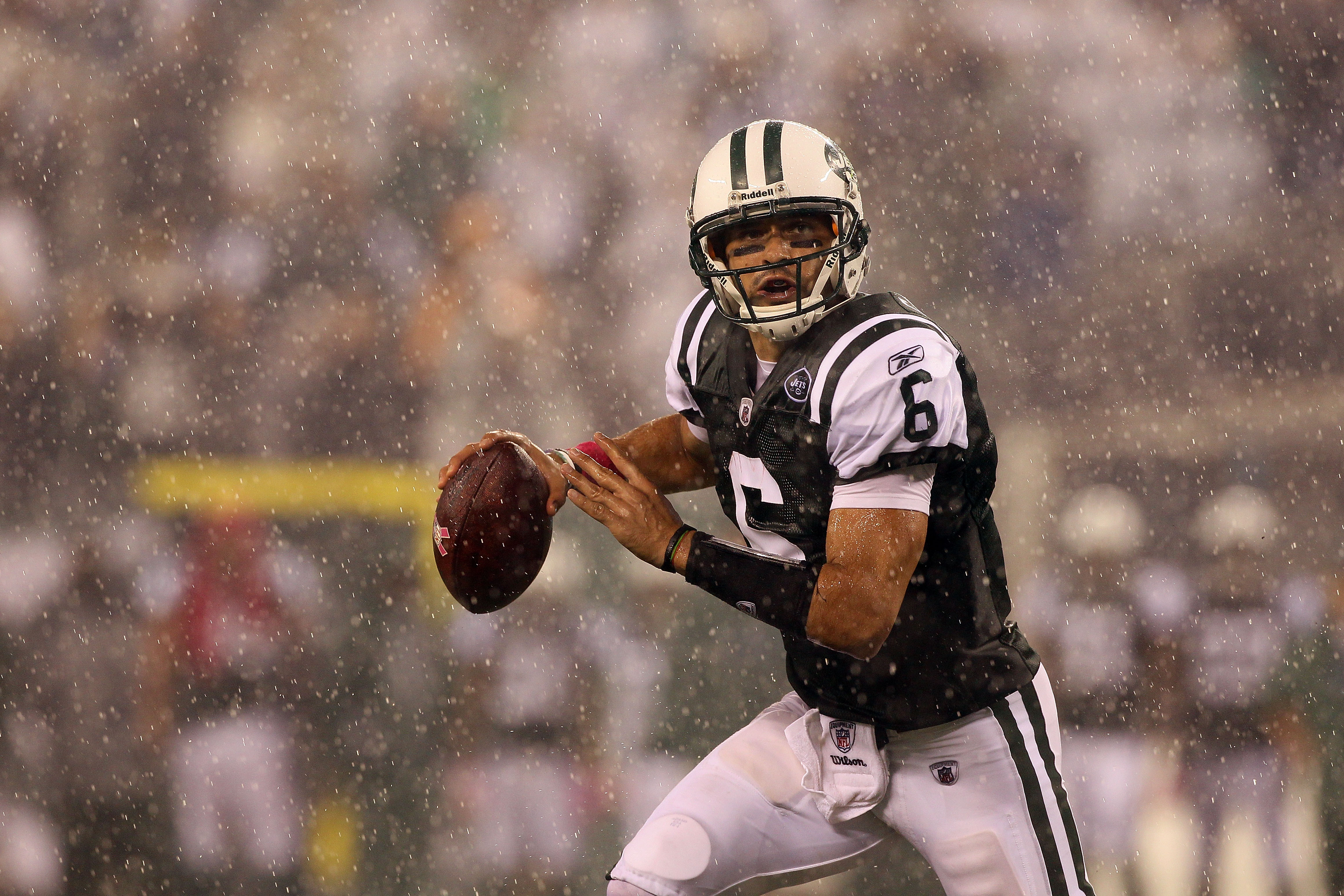 New York Jets quarterback Mark Brunell walks off of the field in the fourth  quarter in week 1 of the NFL Preseason at The New Meadowlands Stadium in  East Rutherford, New Jersey