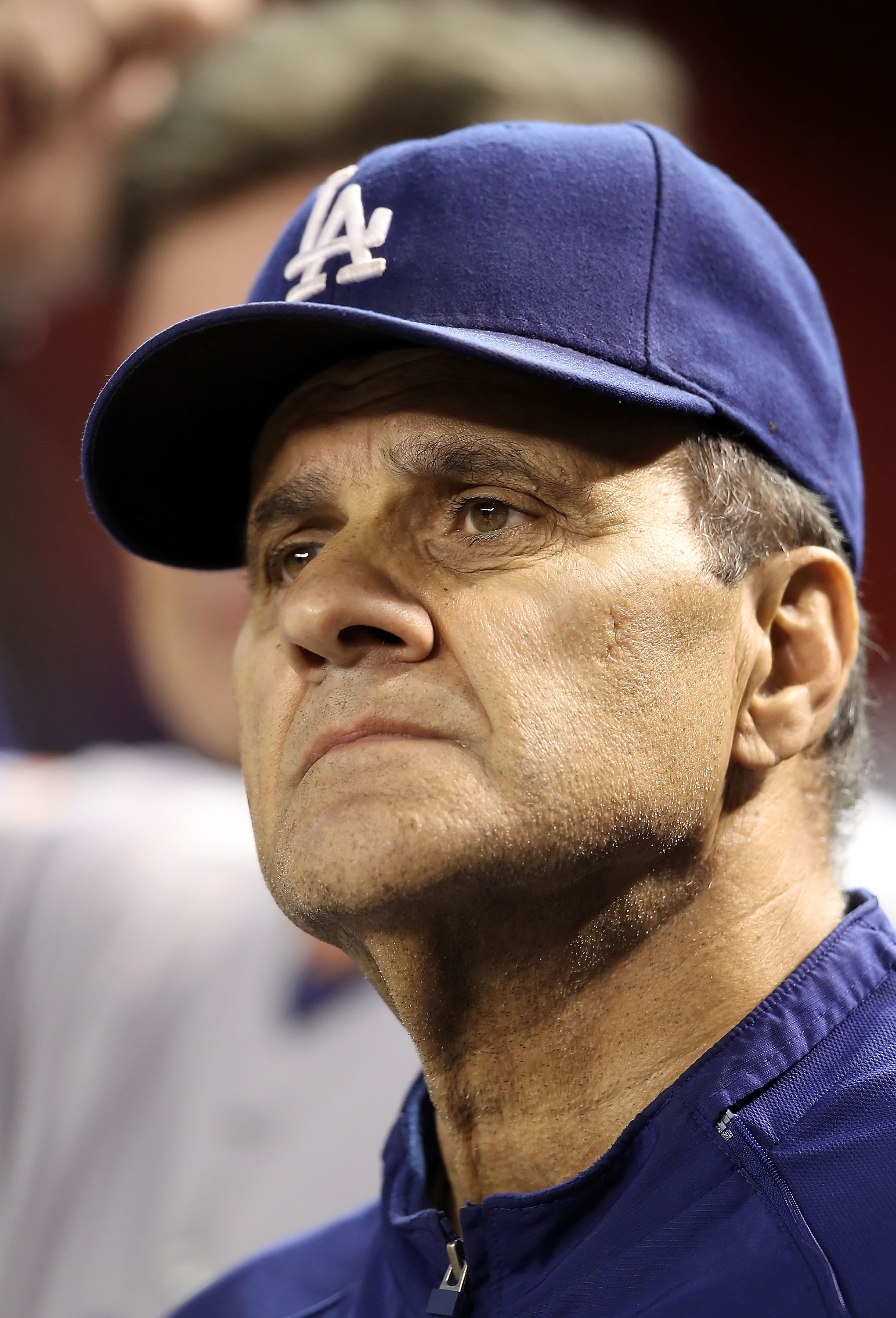 PHOENIX - SEPTEMBER 24:  Manager Joe Torre of the Los Angeles Dodgers watches from the dugout during the Major League Baseball game against the Arizona Diamondbacks at Chase Field on September 24, 2010 in Phoenix, Arizona.  (Photo by Christian Petersen/Ge