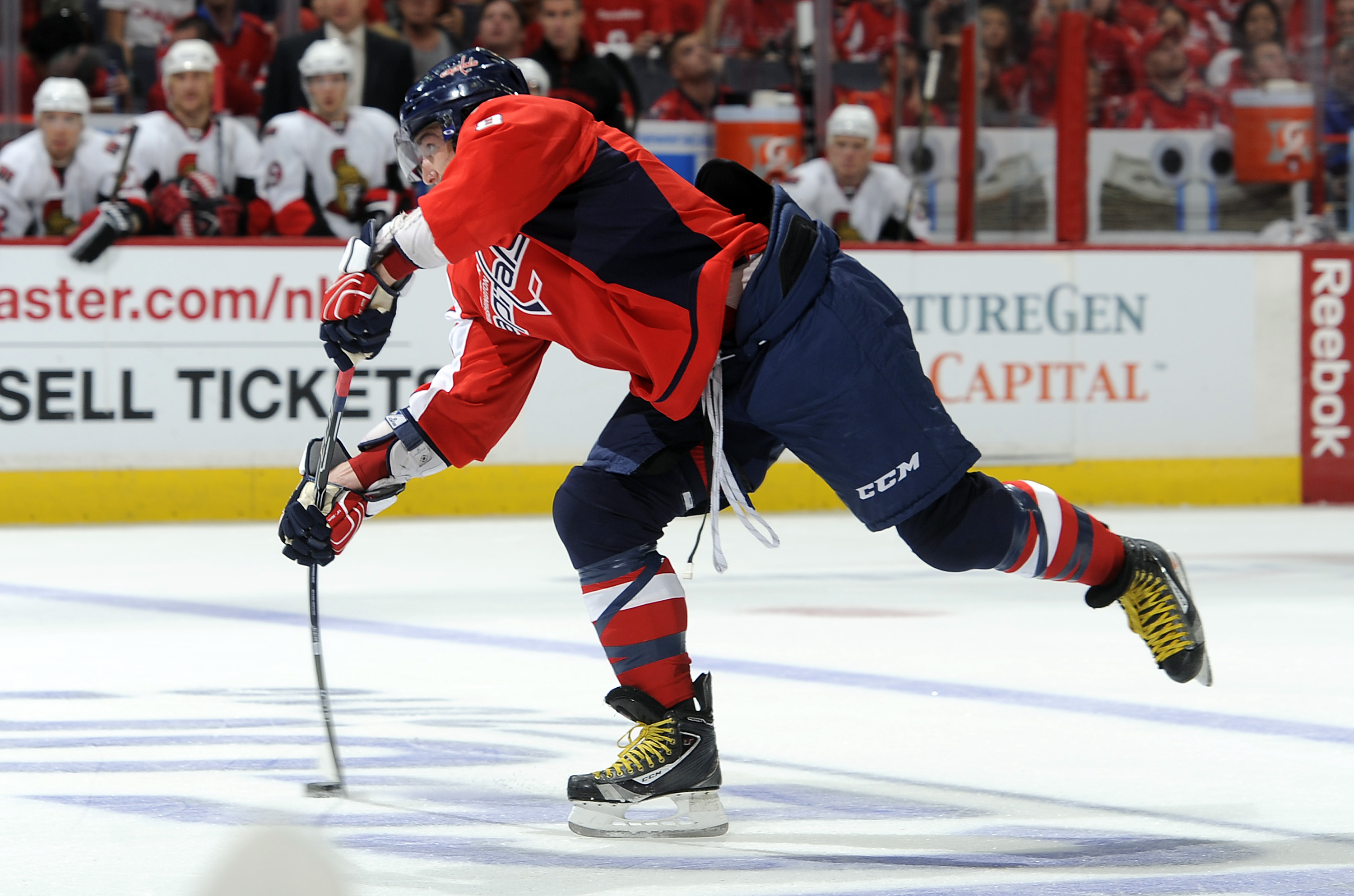 WASHINGTON - OCTOBER 11:  Alex Ovechkin #8 of the Washington Capitals shoots the puck against the Ottawa Senators at the Verizon Center on October 11, 2010 in Washington, DC. The Capitals won the game 3-2. (Photo by Greg Fiume/Getty Images)