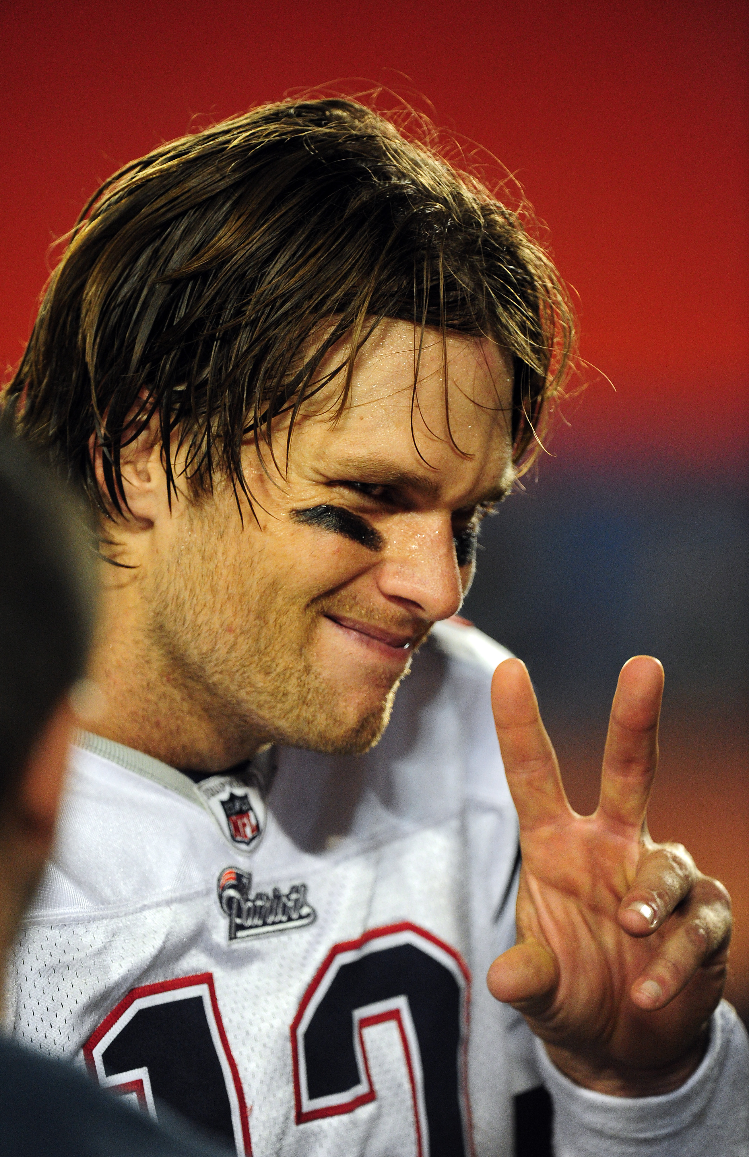 MIAMI - OCTOBER 4: Tom Brady #12 of the New England Patriots celebrates after the game against the Miami Dolphins at Sun Life Field on October 4, 2010 in Miami, Florida. (Photo by Scott Cunningham/Getty Images)