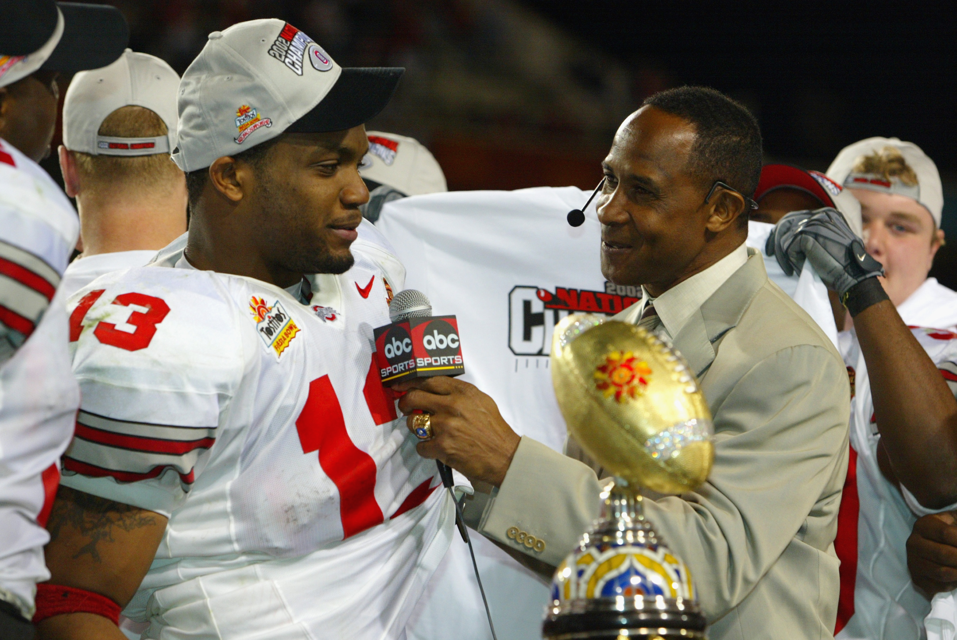 TEMPE, AZ - JANUARY 3:  Running back Maurice Clarett #13 of the Ohio State Buckeyes is interviewed by Lynn Swann after deafeating the Miami Hurricanes in the Tostitos Fiesta Bowl on January 3, 2003 at Sun Devil Stadium in Tempe, Arizona.  Ohio State won t